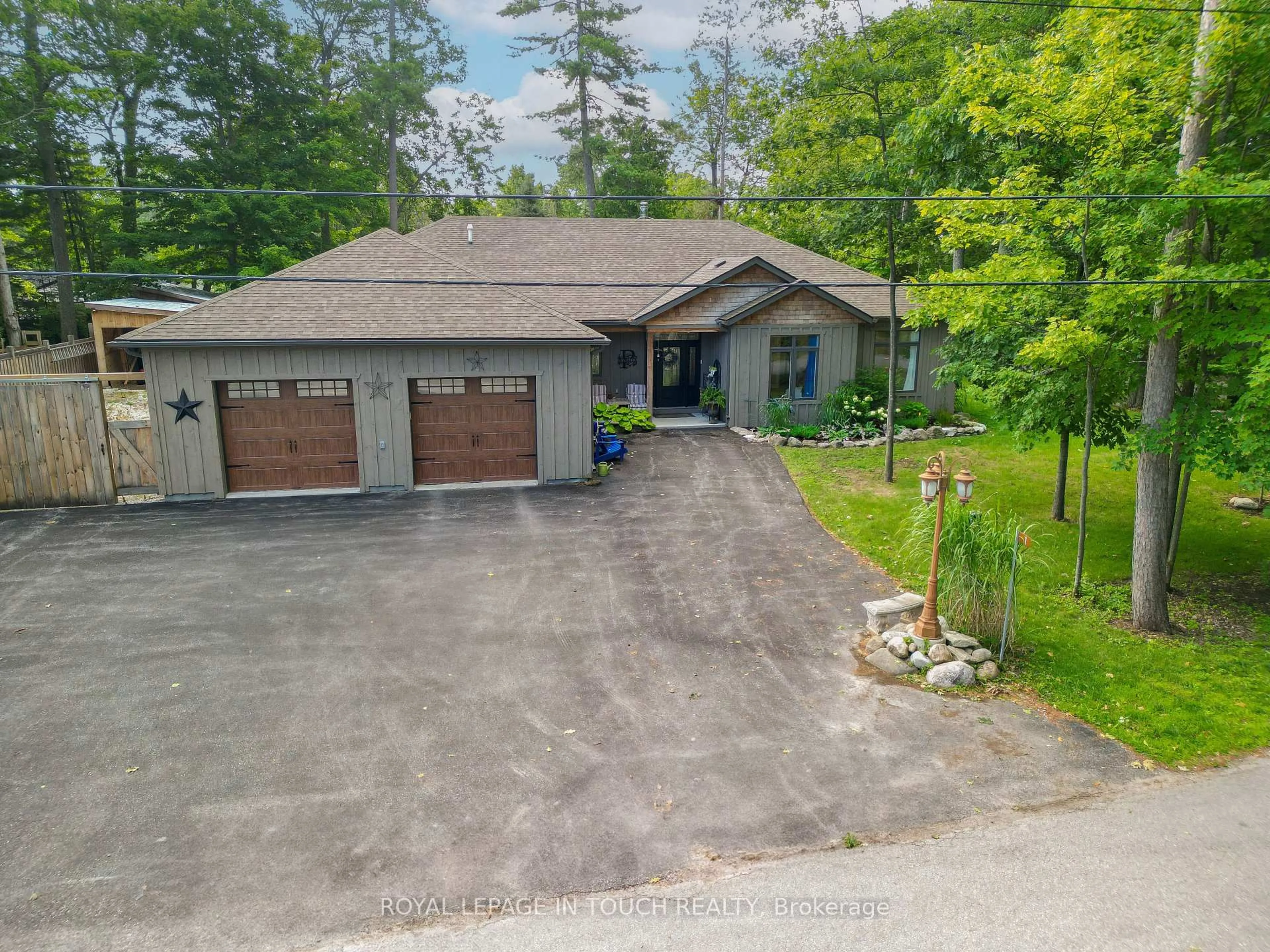 A pic from outside/outdoor area/front of a property/back of a property/a pic from drone, unknown for 1 Spruce St, Tiny Ontario L0L 1P0