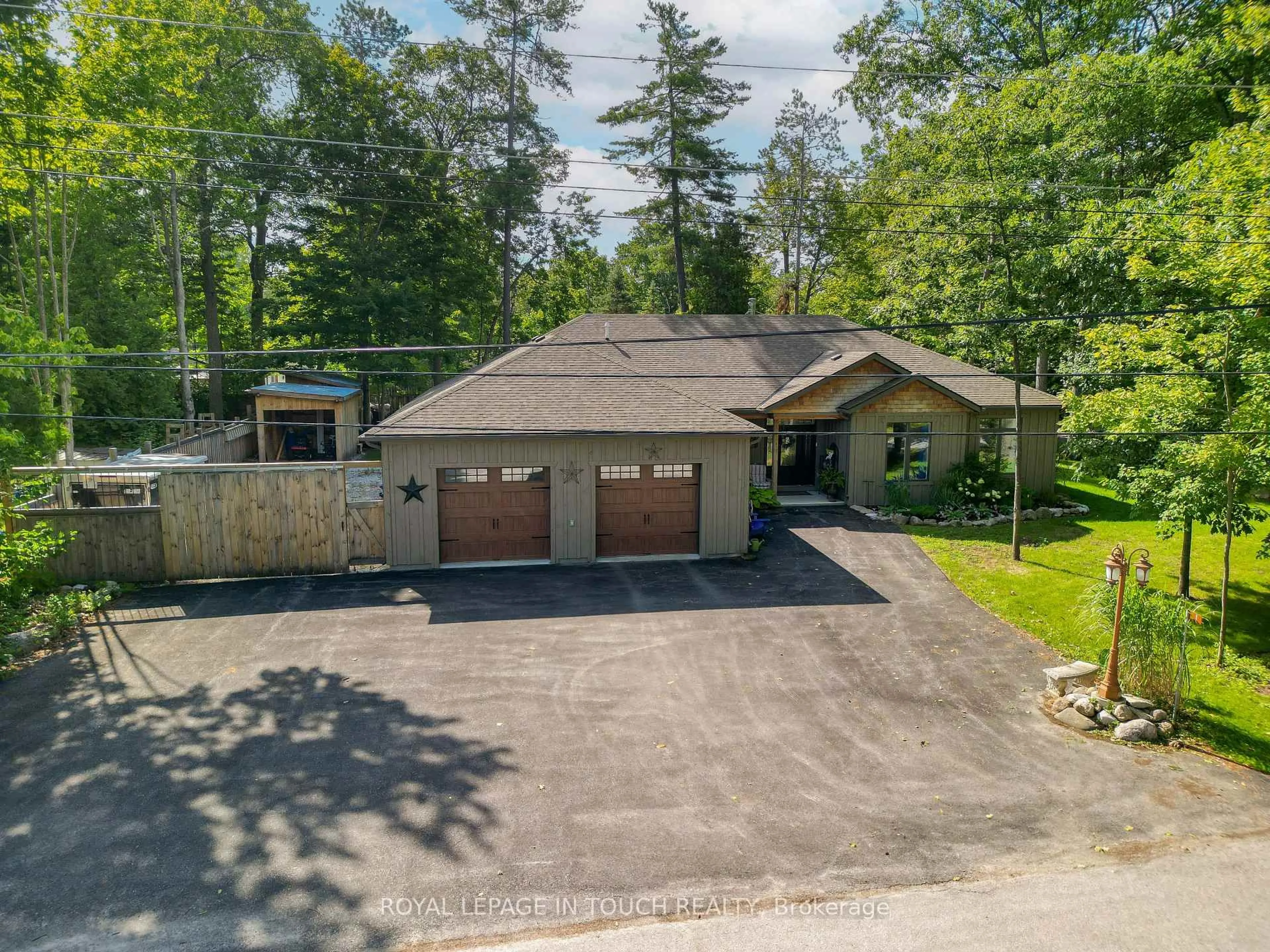 A pic from outside/outdoor area/front of a property/back of a property/a pic from drone, street for 1 Spruce St, Tiny Ontario L0L 1P0
