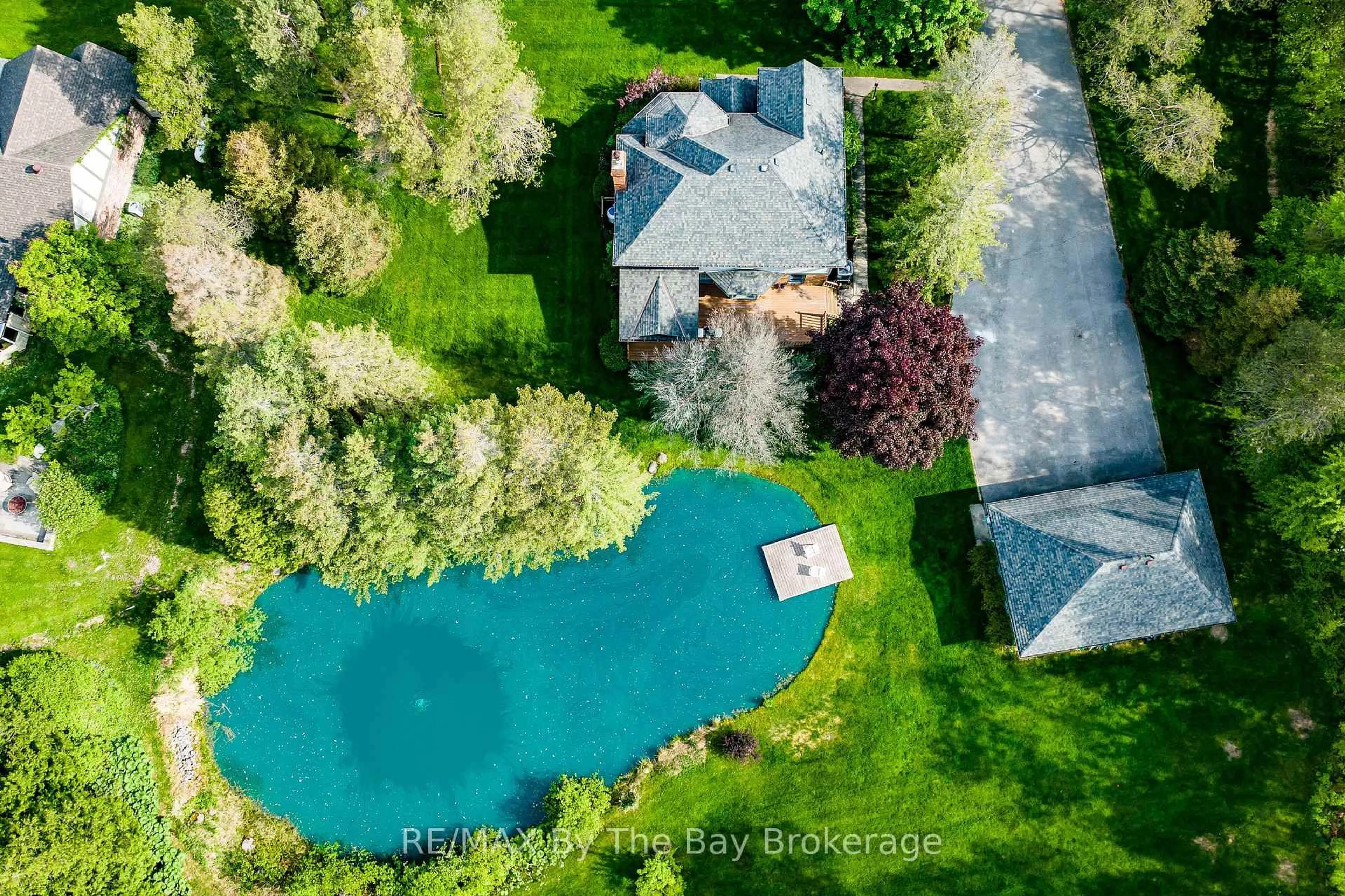 A pic from outside/outdoor area/front of a property/back of a property/a pic from drone, water/lake/river/ocean view for 9 Purple Hill Lane, Clearview Ontario L0M 1G0