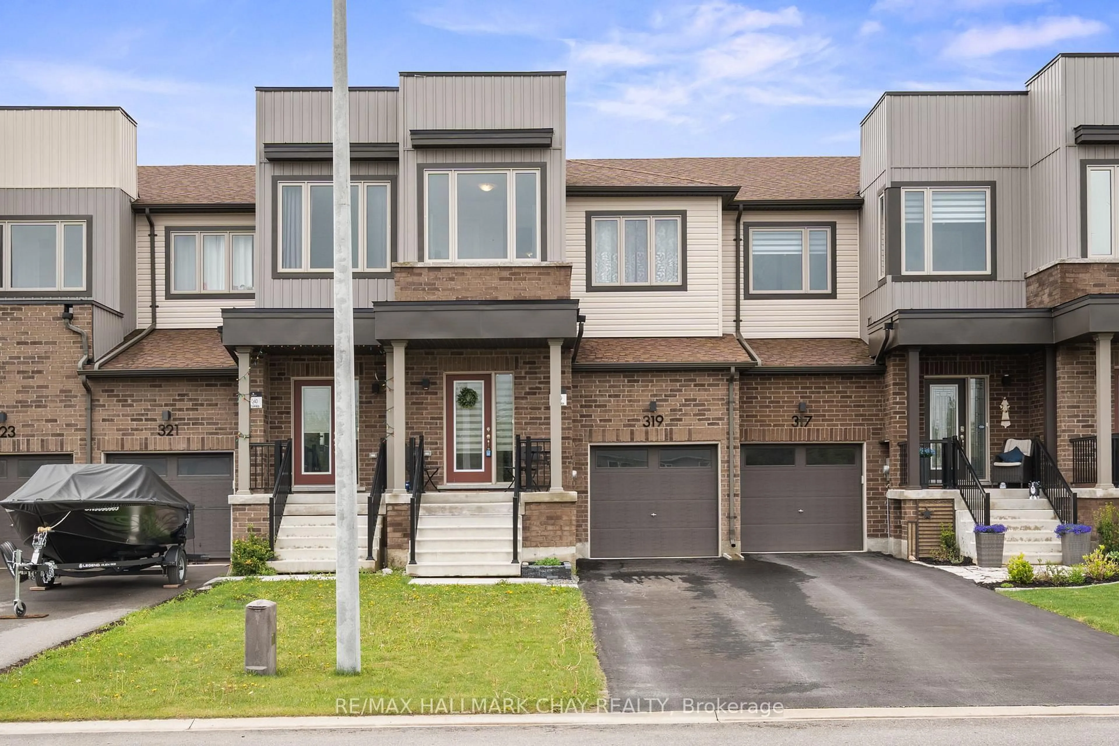 Home with brick exterior material, street for 319 ATKINSON St, Clearview Ontario L0M 1S0