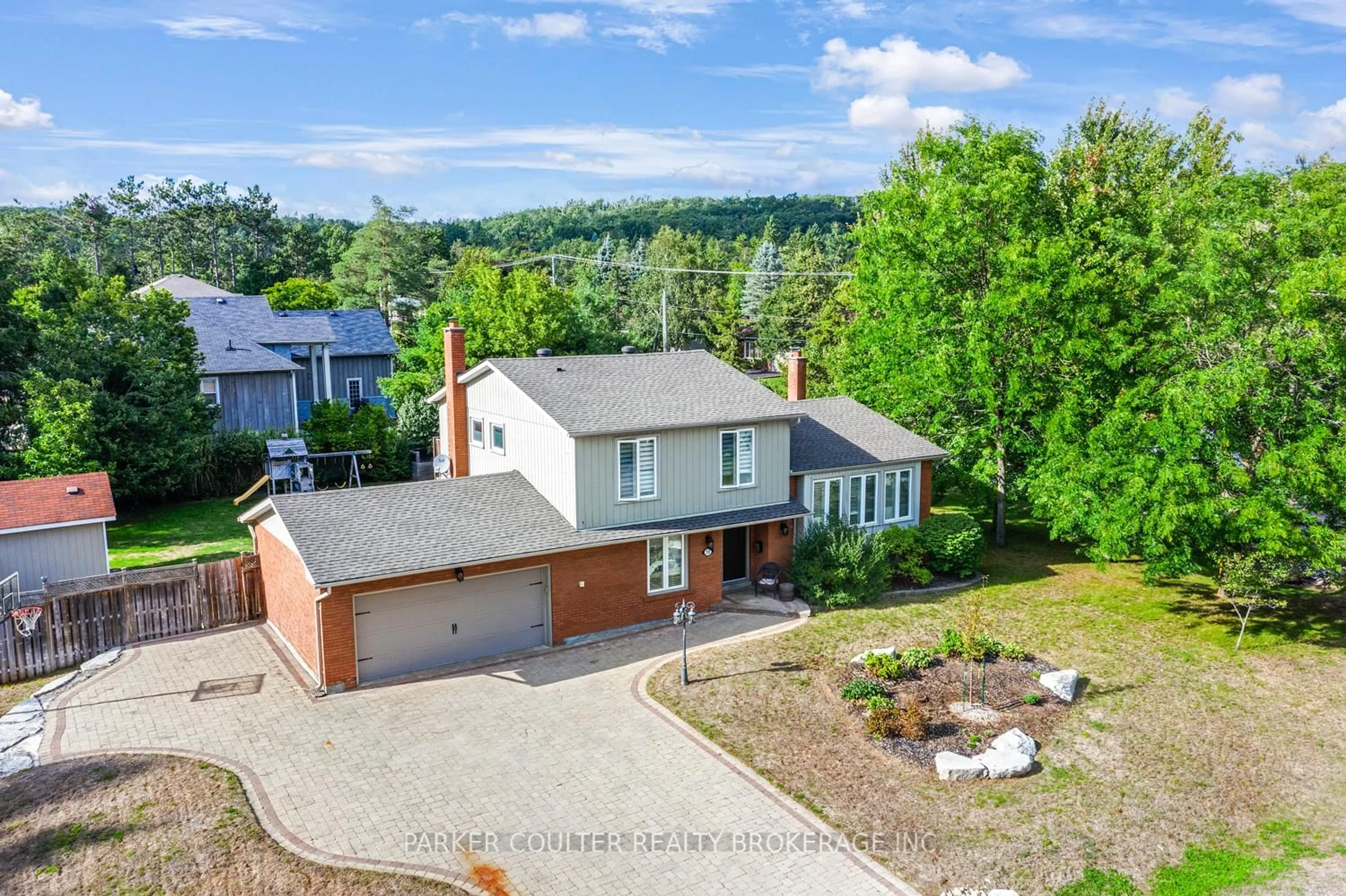 A pic from outside/outdoor area/front of a property/back of a property/a pic from drone, unknown for 30 Cedar Creek Rd, Springwater Ontario L9X 0P5