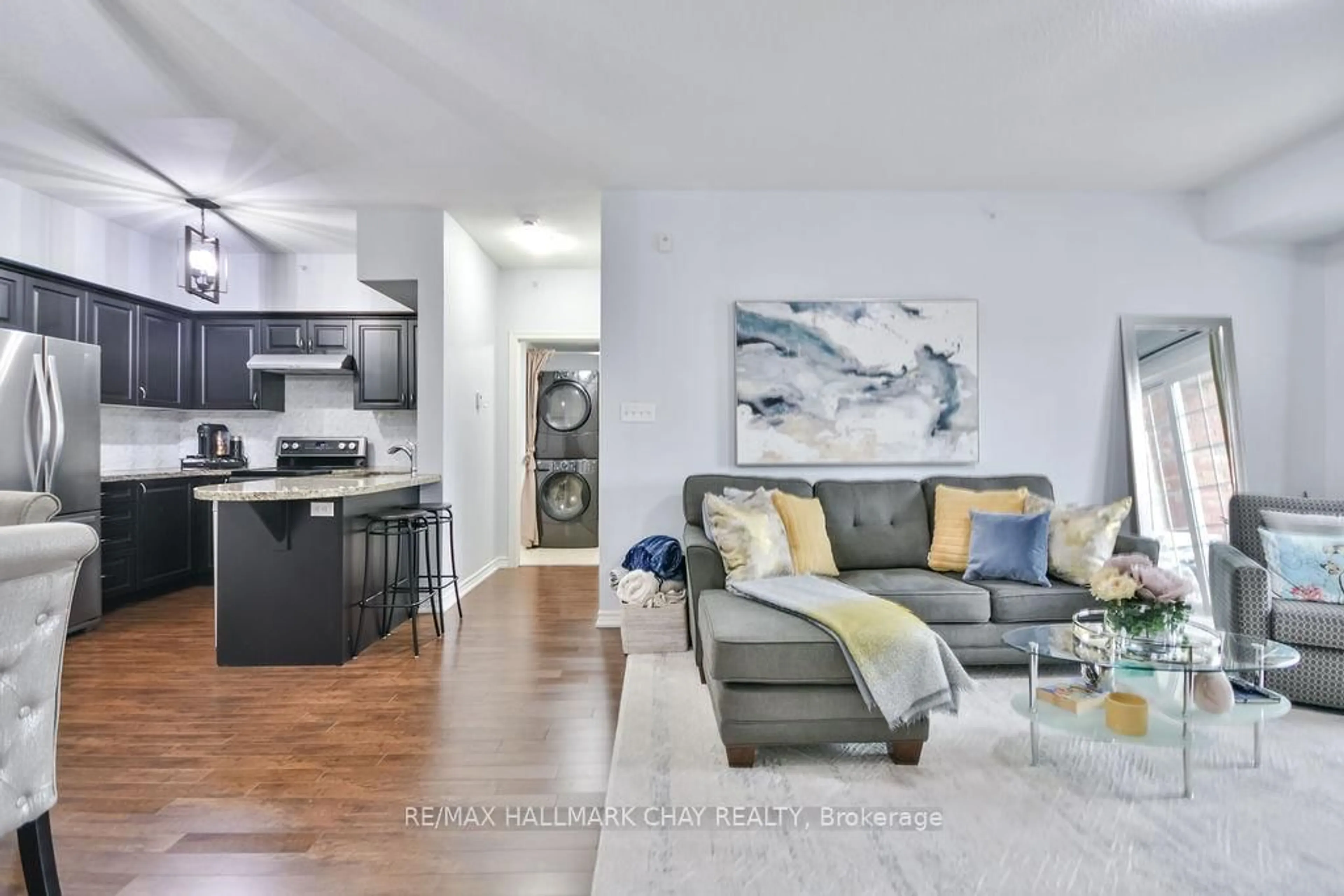 Living room with furniture, unknown for 43 Ferndale Dr #207, Barrie Ontario L4N 5W6