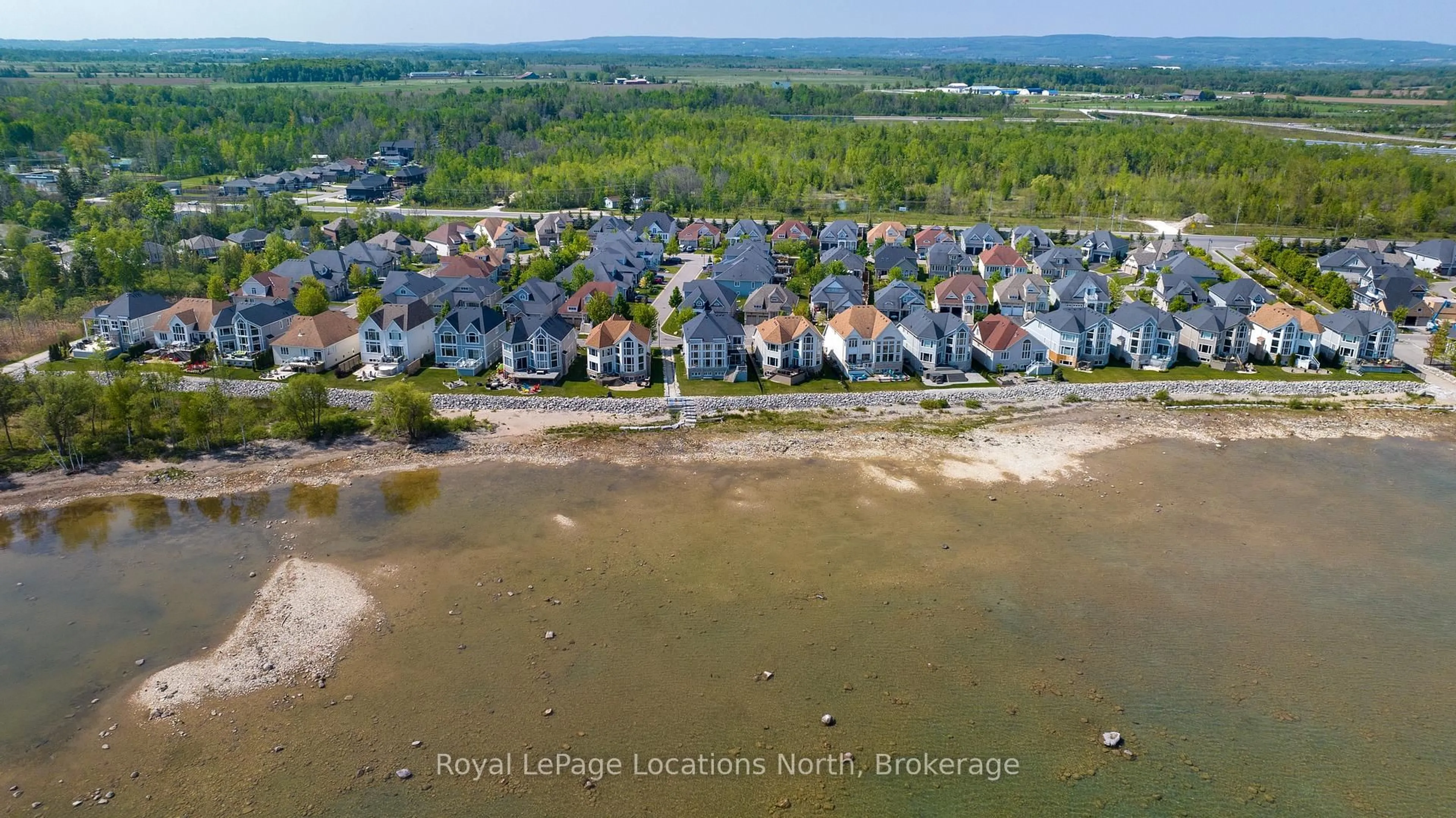 A pic from outside/outdoor area/front of a property/back of a property/a pic from drone, water/lake/river/ocean view for 61 Waterview Rd, Wasaga Beach Ontario L9Z 0E9