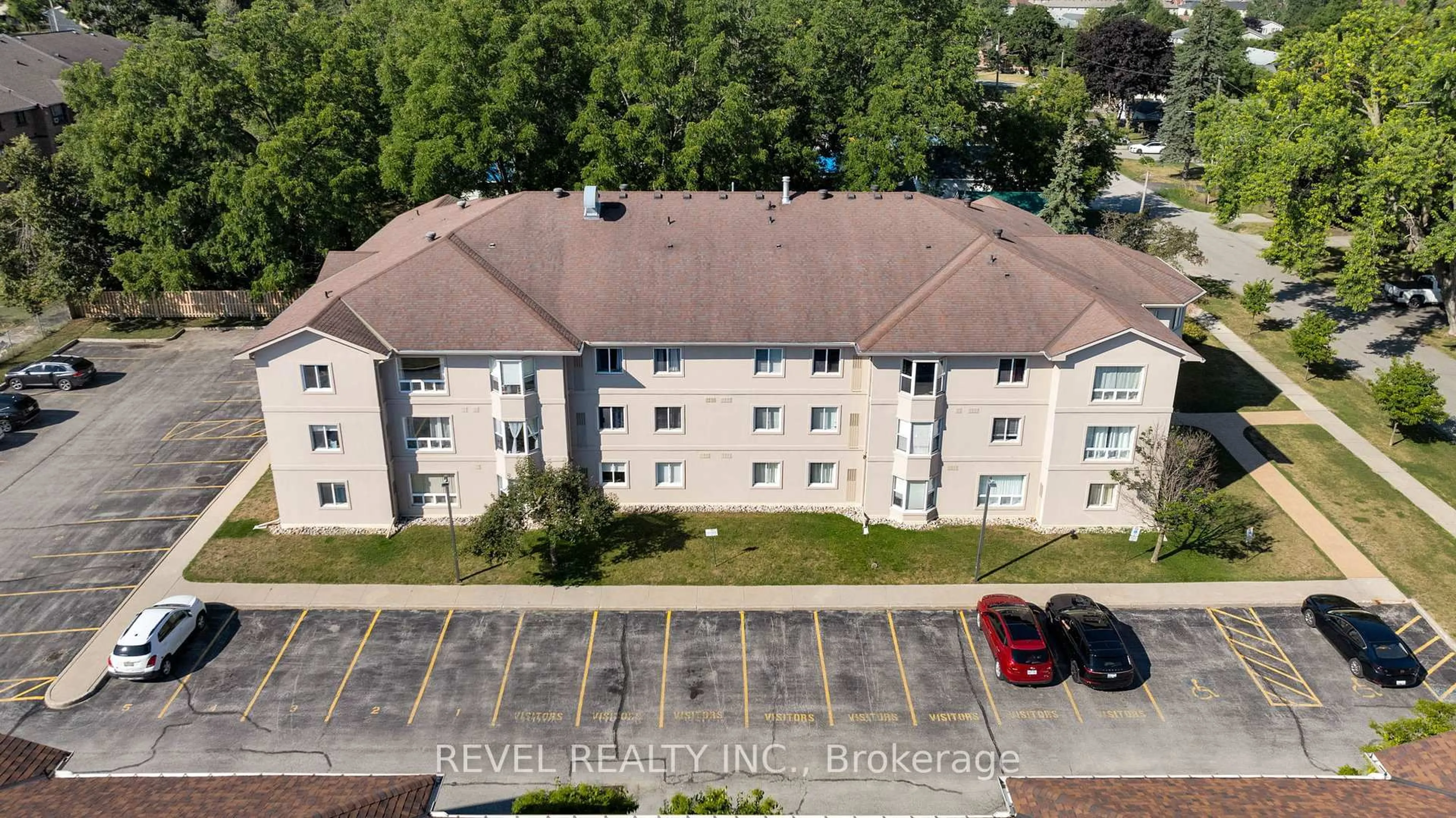 A pic from outside/outdoor area/front of a property/back of a property/a pic from drone, unknown for 107 Bond St #206, Orillia Ontario L3V 1J7