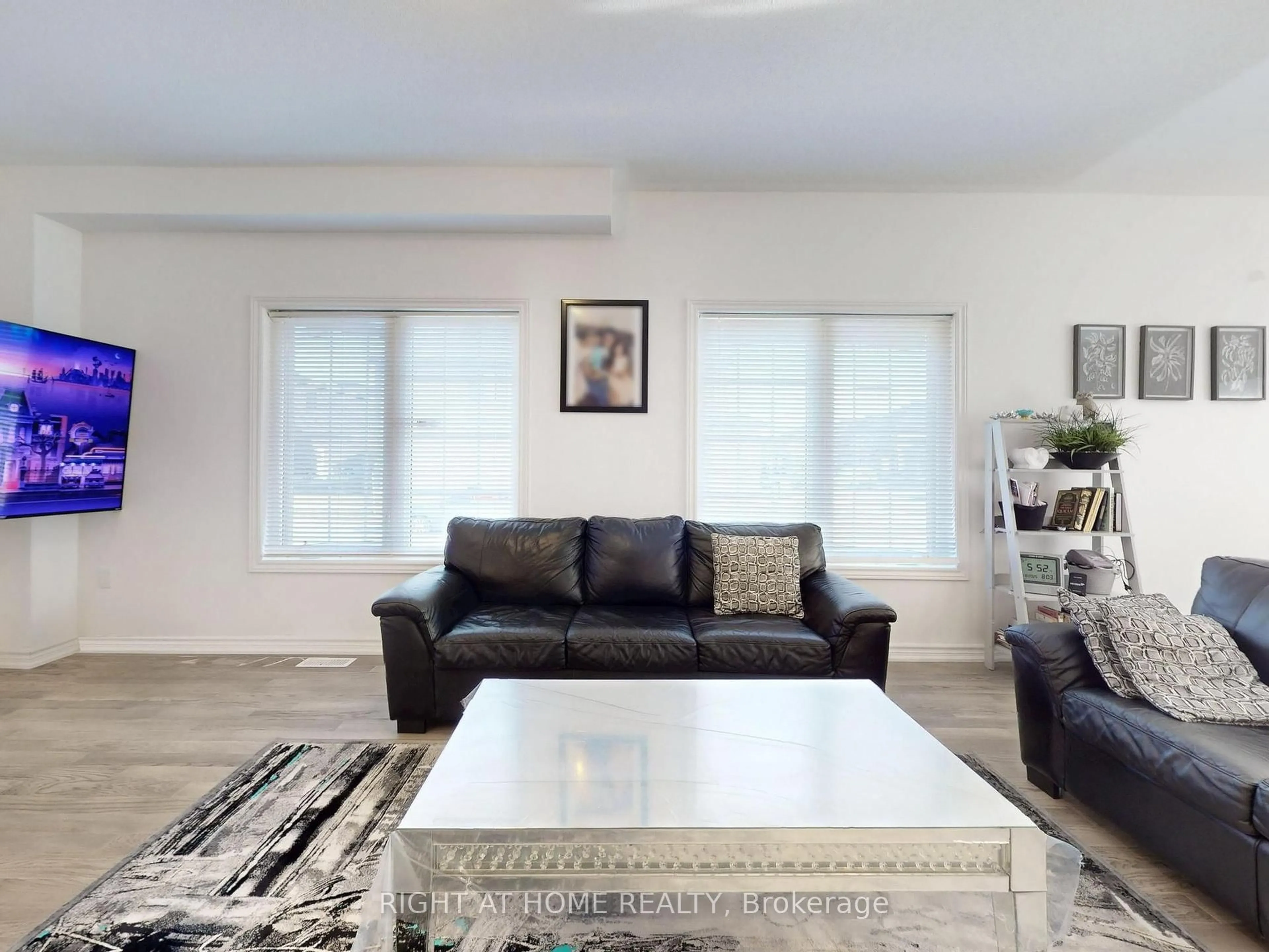 Living room with furniture, unknown for 1 Harvest Cres, Barrie Ontario L9J 0T3