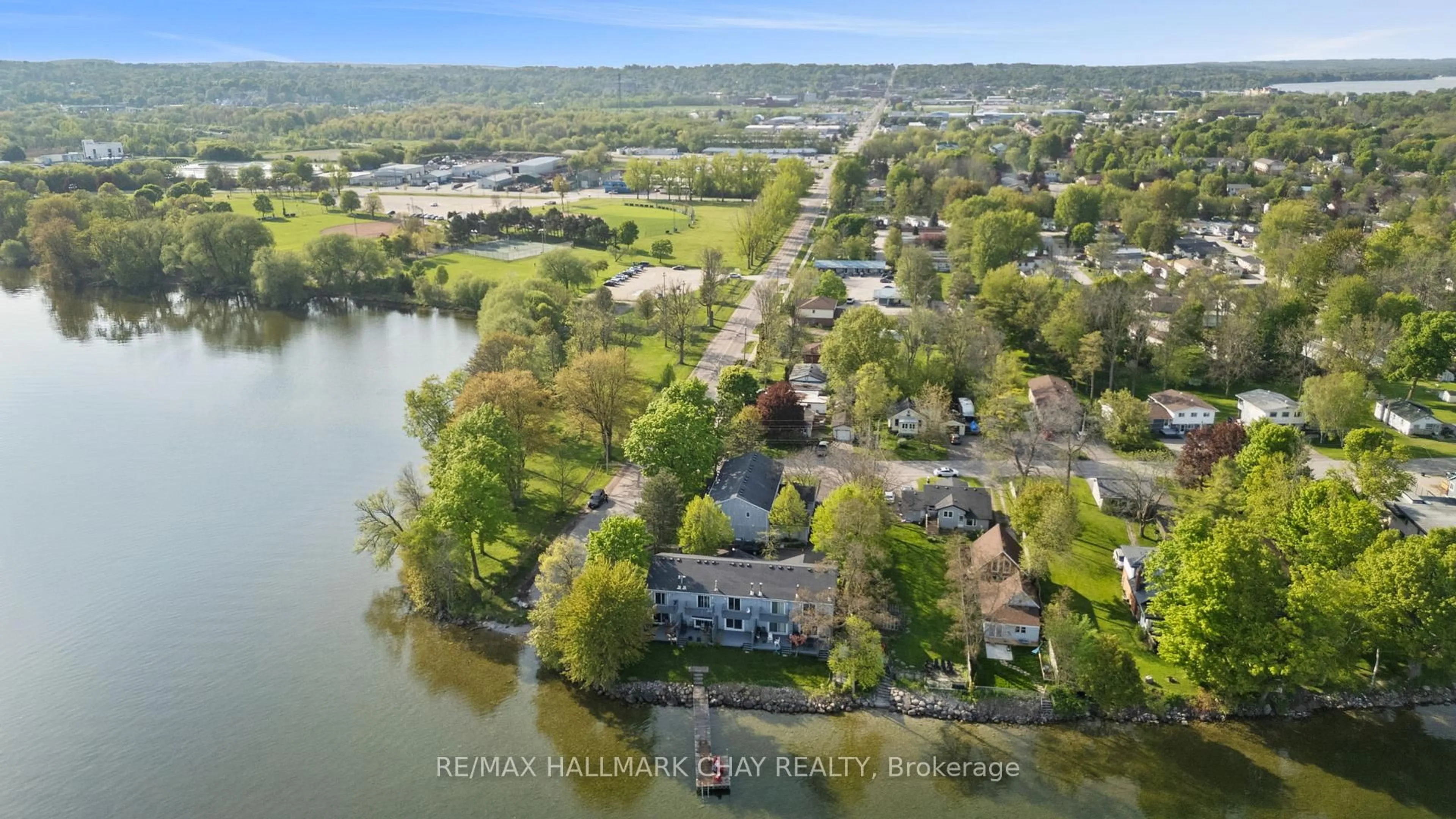 A pic from outside/outdoor area/front of a property/back of a property/a pic from drone, water/lake/river/ocean view for 1 Olive Cres #4, Orillia Ontario L3V 7N5