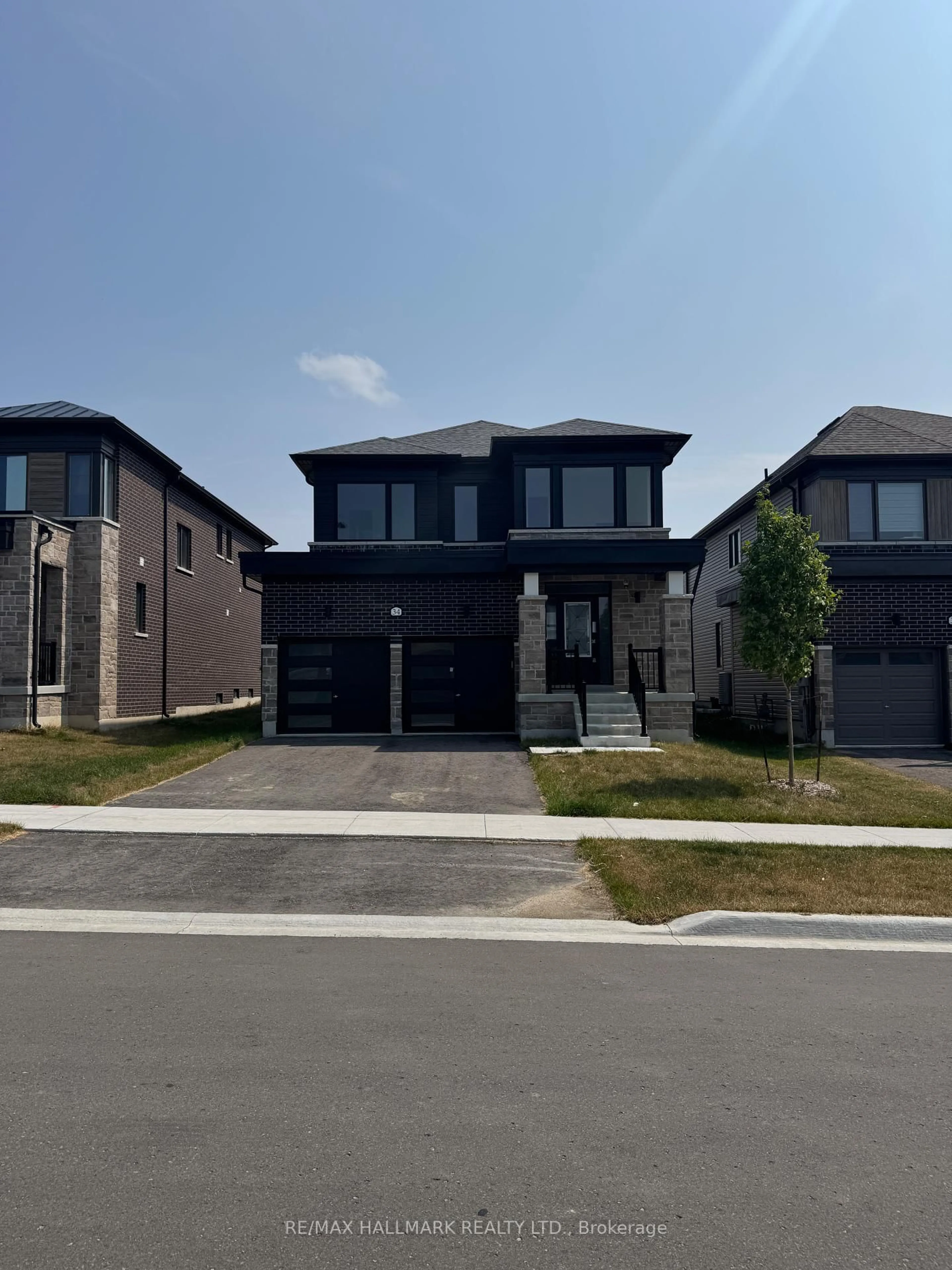 Home with brick exterior material, street for 34 Nicort Rd, Wasaga Beach Ontario L9Z 0N4