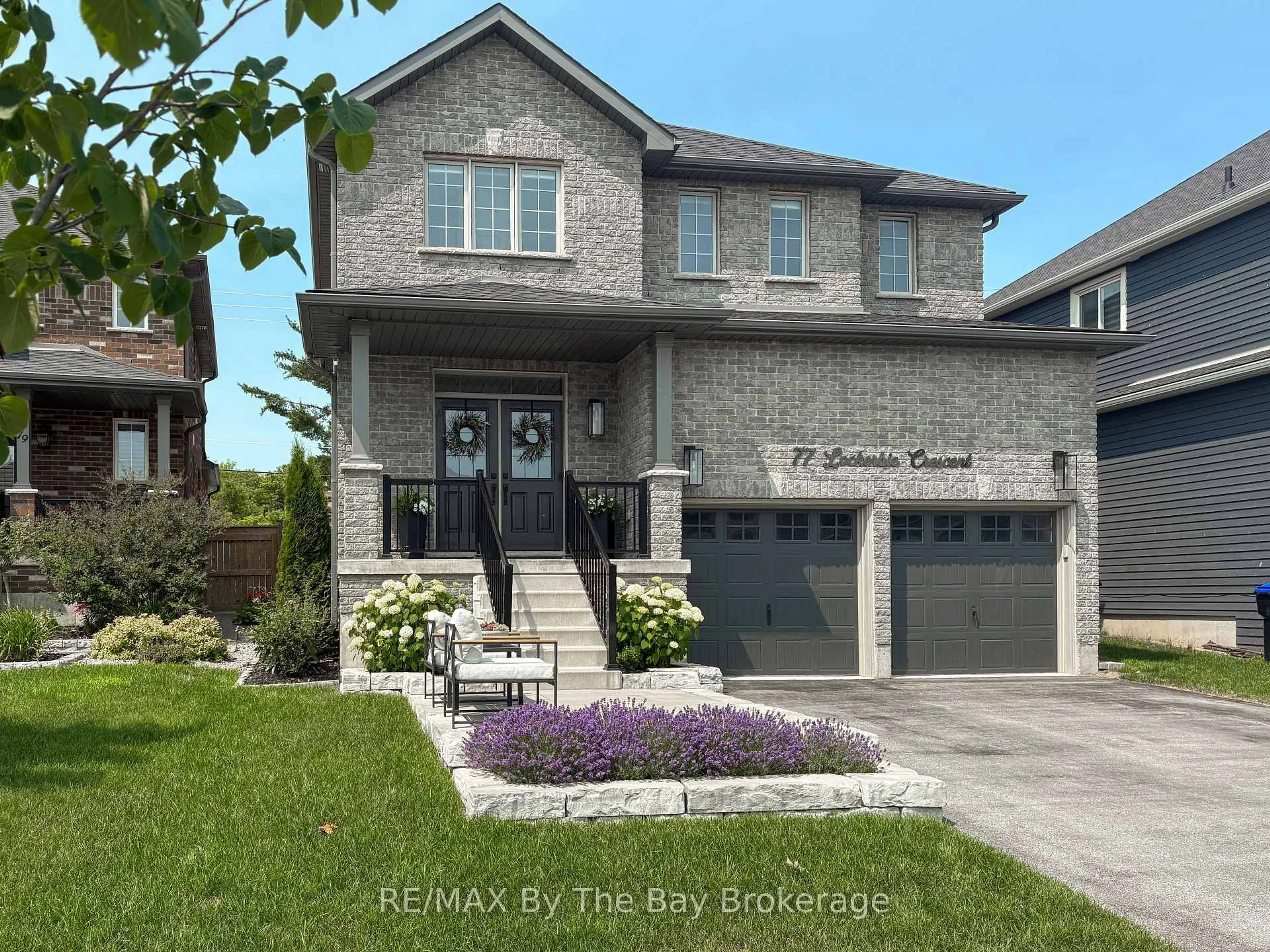 Home with brick exterior material, street for 77 Lockerbie Cres, Collingwood Ontario L9Y 0Y8