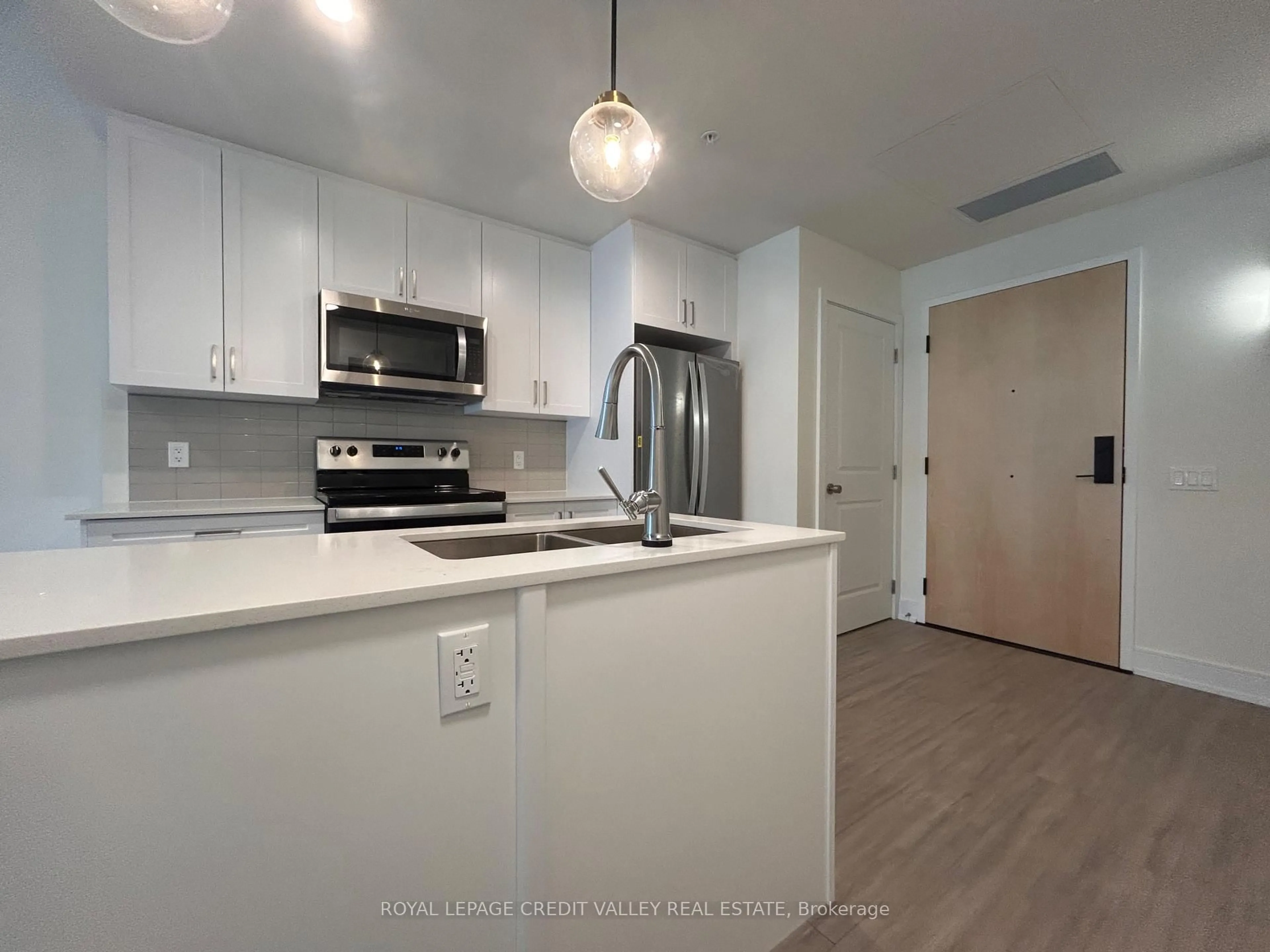 Open concept kitchen, unknown for 121 Mary St #201, Clearview Ontario L0M 1G0