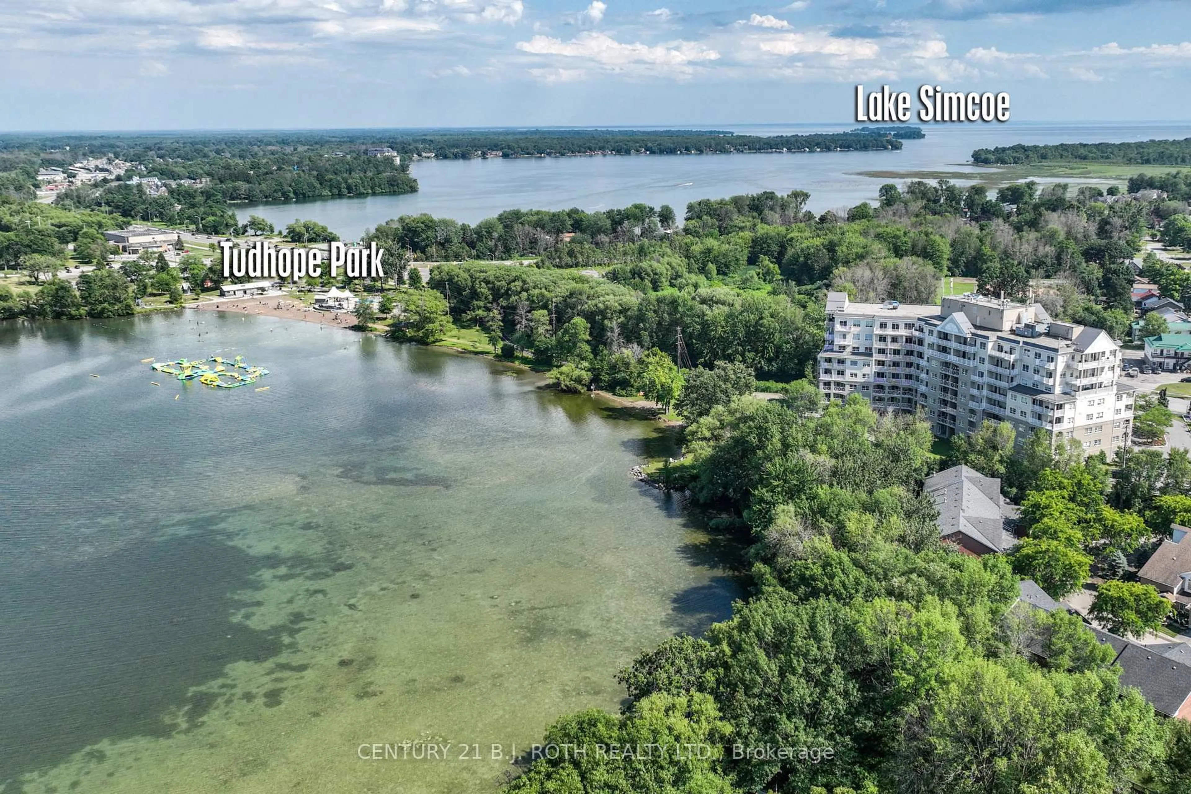 A pic from outside/outdoor area/front of a property/back of a property/a pic from drone, water/lake/river/ocean view for 354 Atherley Rd #304, Orillia Ontario L3V 0B8