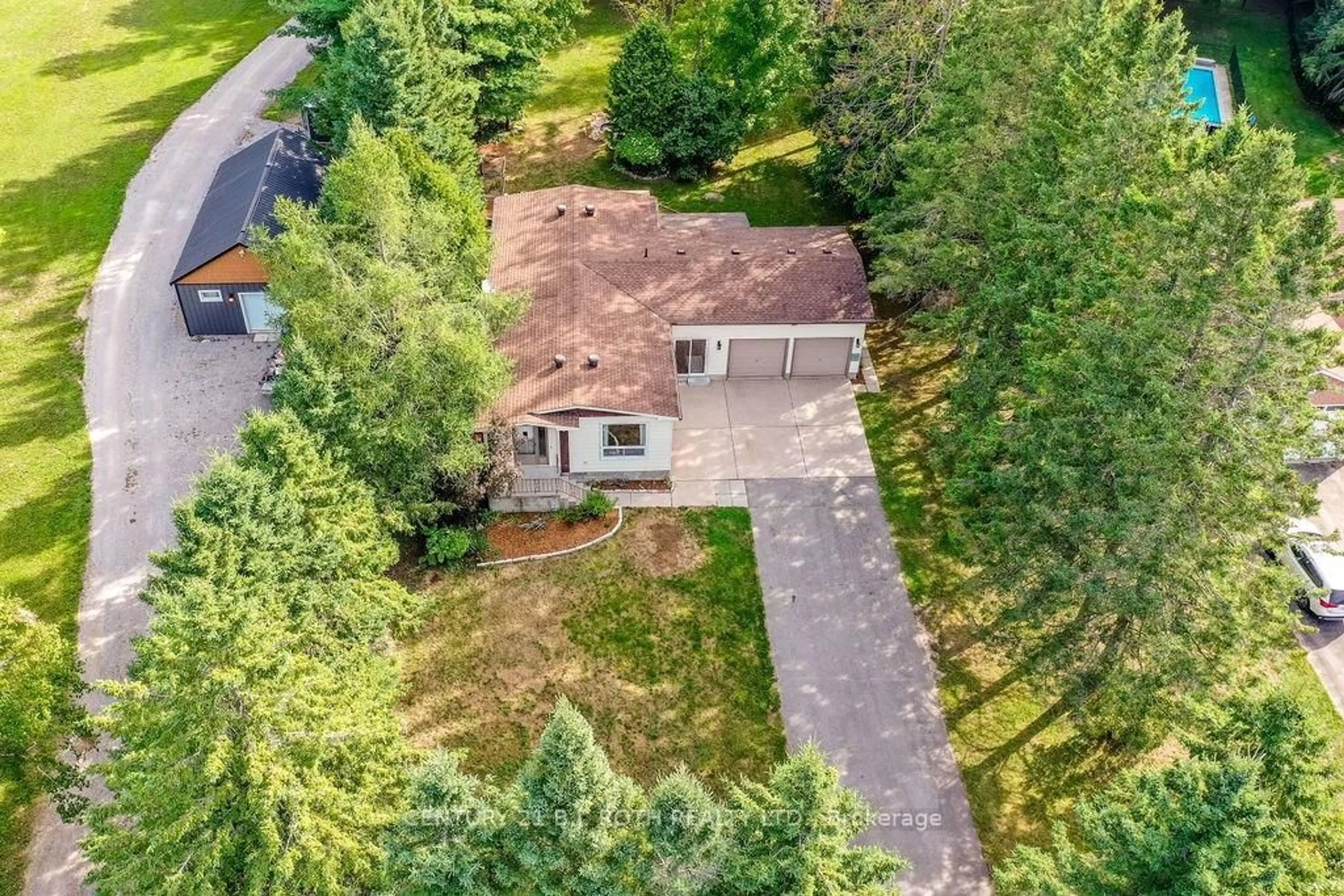 A pic from outside/outdoor area/front of a property/back of a property/a pic from drone, unknown for 2095 DWYER Rd, Springwater Ontario L9X 1L7