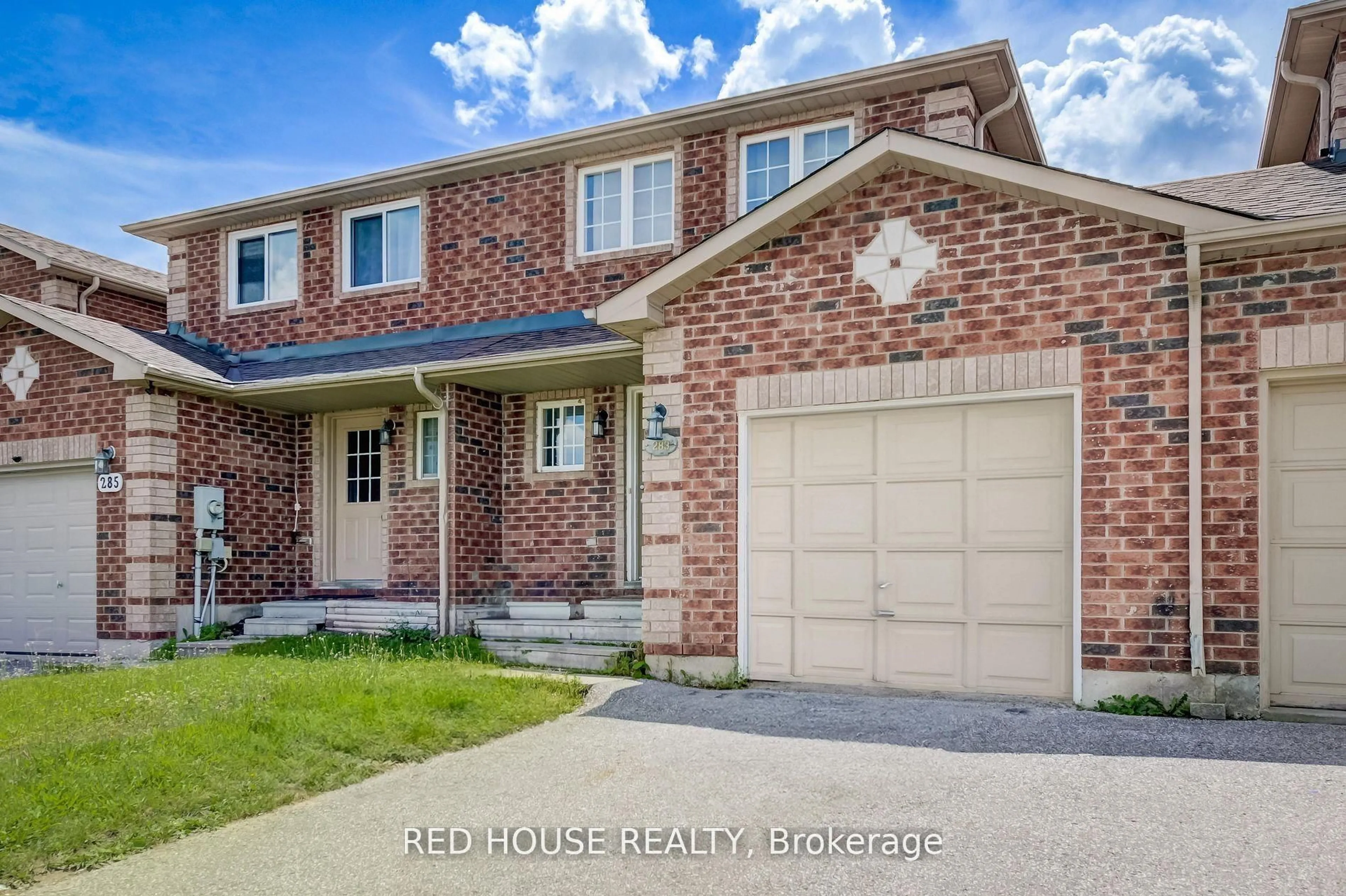 Home with brick exterior material, street for 283 Dunsmore Lane, Barrie Ontario L4M 7A7