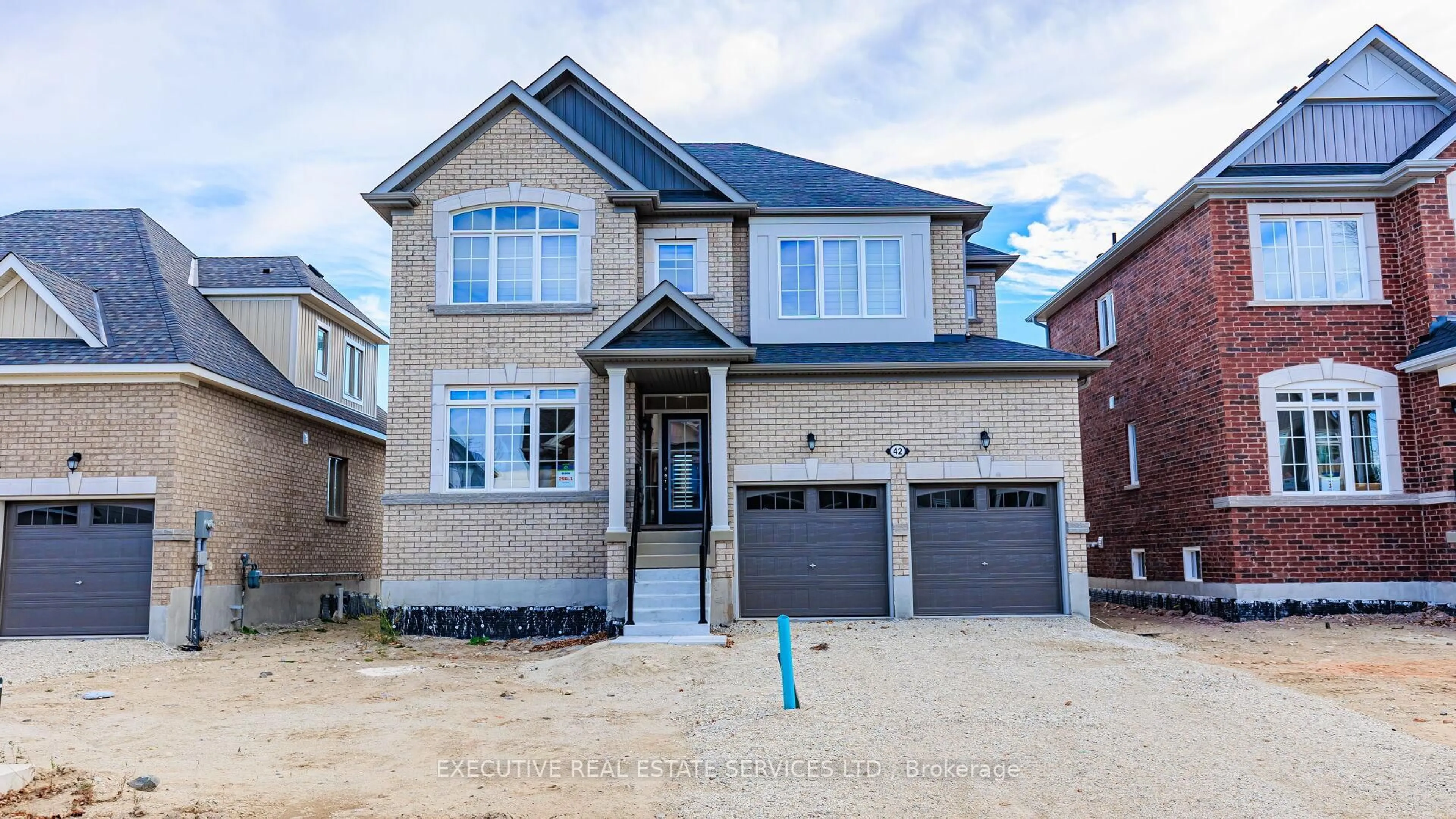 Home with brick exterior material, street for 42 Tracey Lane, Collingwood Ontario L9Y 3L7