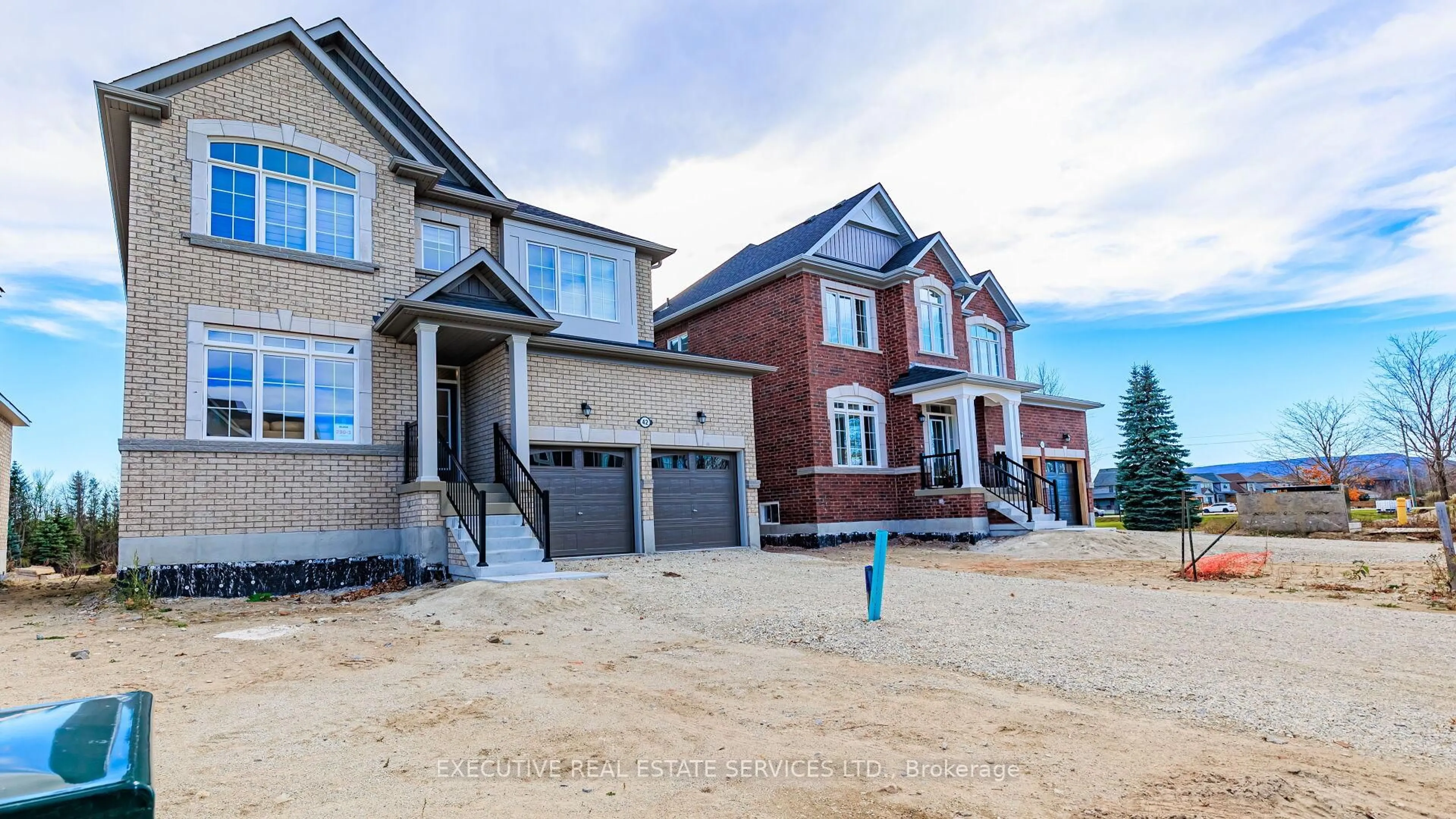 Home with brick exterior material, street for 42 Tracey Lane, Collingwood Ontario L9Y 3L7