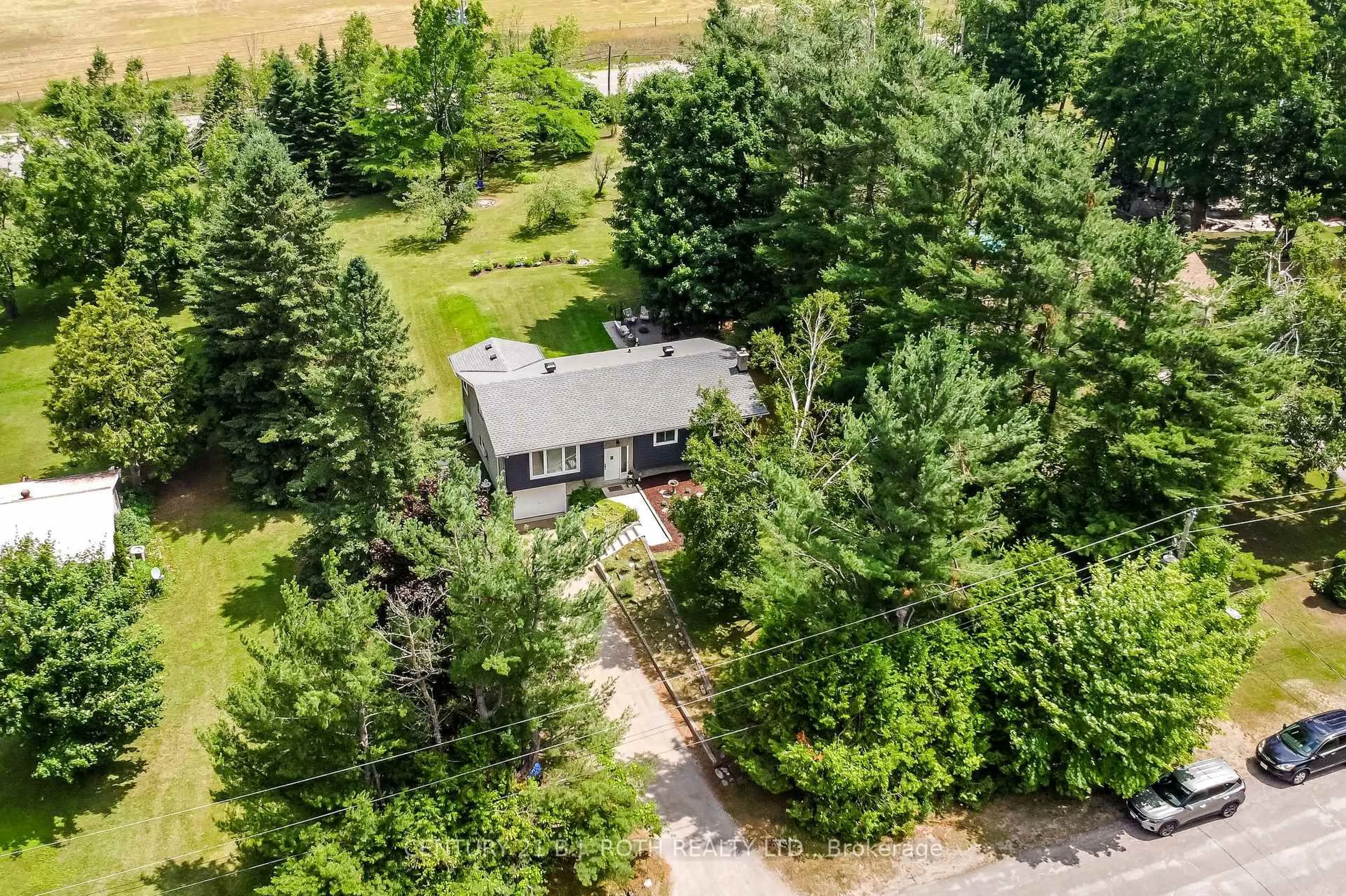 A pic from outside/outdoor area/front of a property/back of a property/a pic from drone, forest/trees view for 23 Conder Dr, Oro-Medonte Ontario L0K 1E0