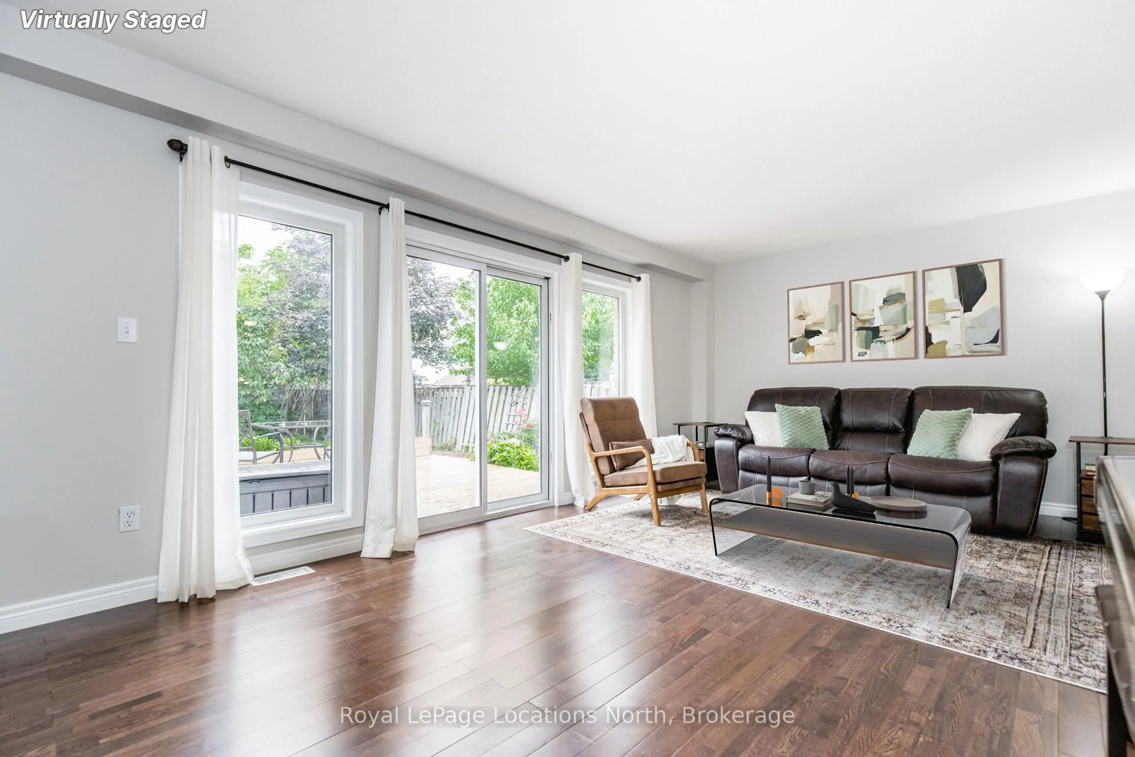Living room with furniture, wood/laminate floor for 64 Marina Cres, Collingwood Ontario L9Y 5N3