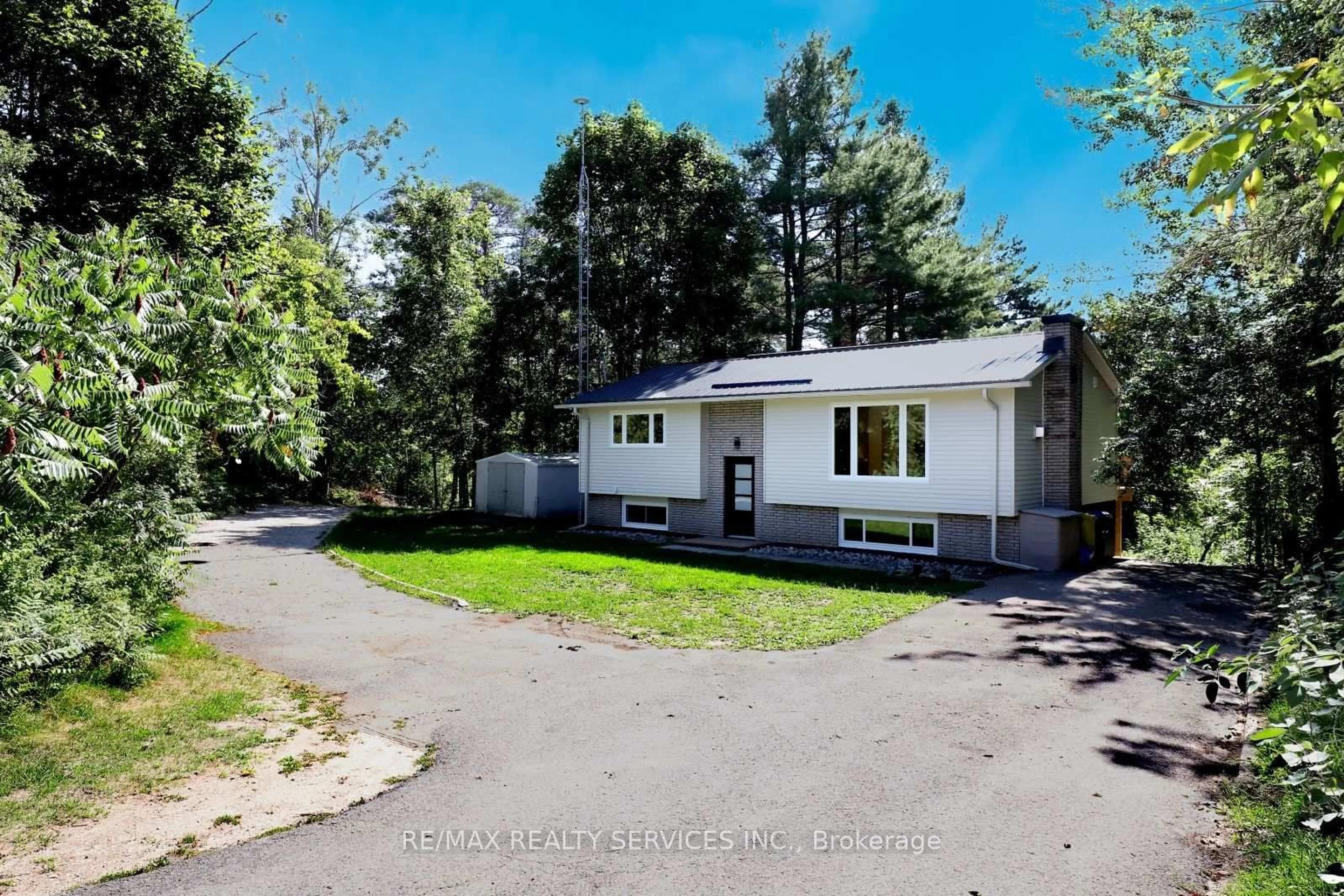 A pic from outside/outdoor area/front of a property/back of a property/a pic from drone, street for 8570 Hwy 12, Oro-Medonte Ontario L3V 6H2