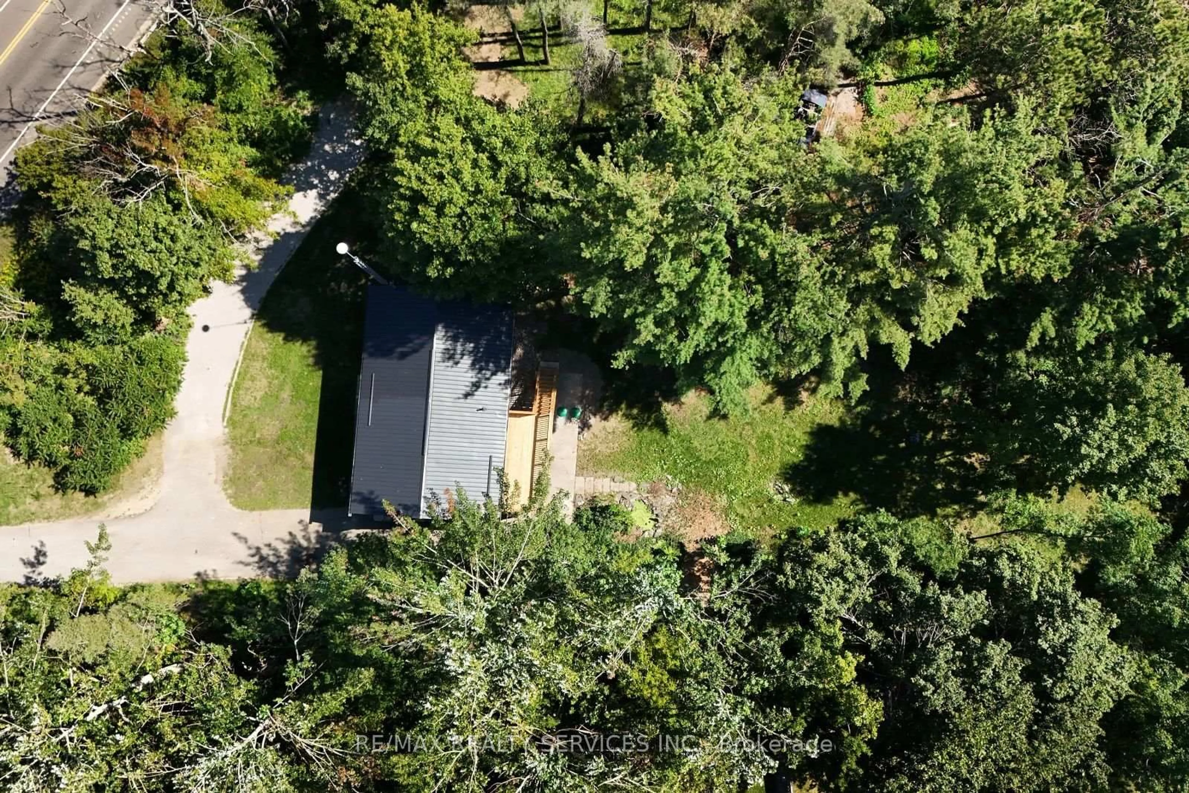 A pic from outside/outdoor area/front of a property/back of a property/a pic from drone, forest/trees view for 8570 Hwy 12, Oro-Medonte Ontario L3V 6H2
