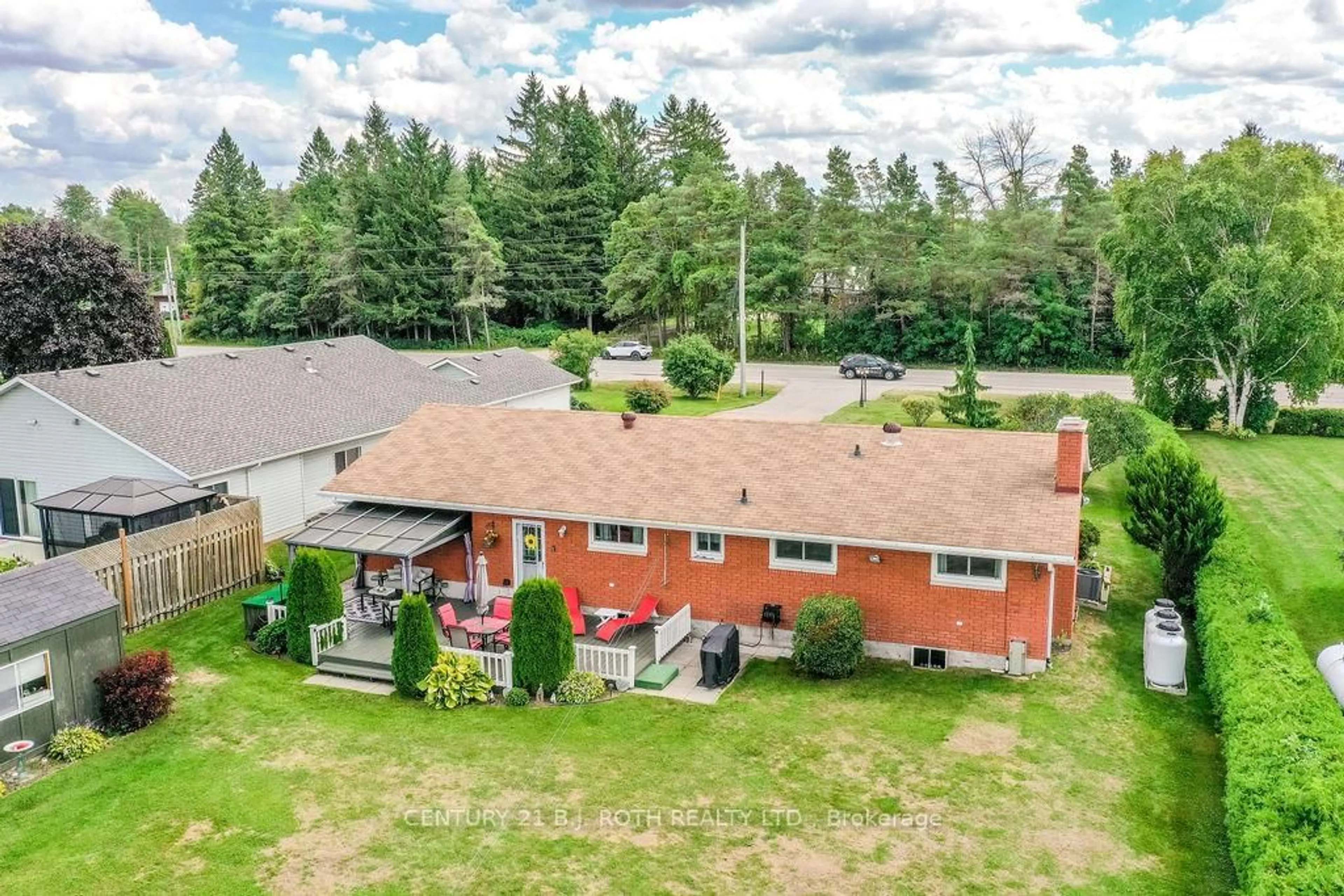 A pic from outside/outdoor area/front of a property/back of a property/a pic from drone, unknown for 1452 County 92 Rd, Springwater Ontario L0L 1P0