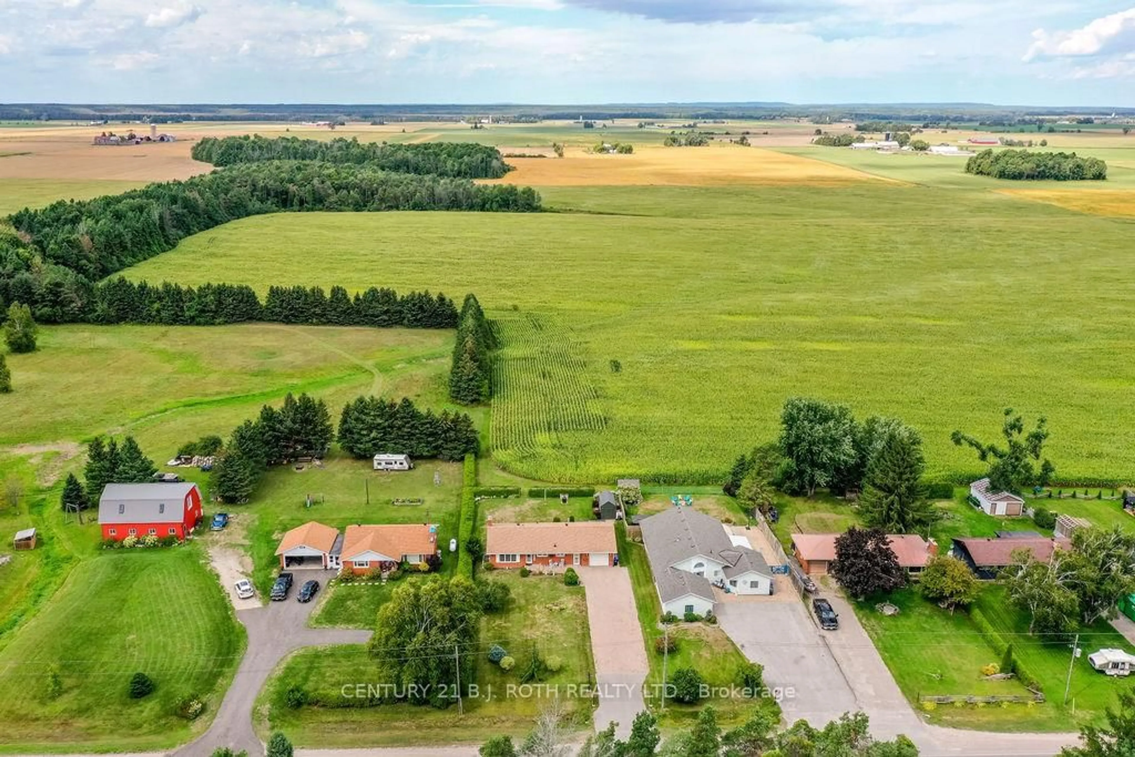 A pic from outside/outdoor area/front of a property/back of a property/a pic from drone, unknown for 1452 County 92 Rd, Springwater Ontario L0L 1P0