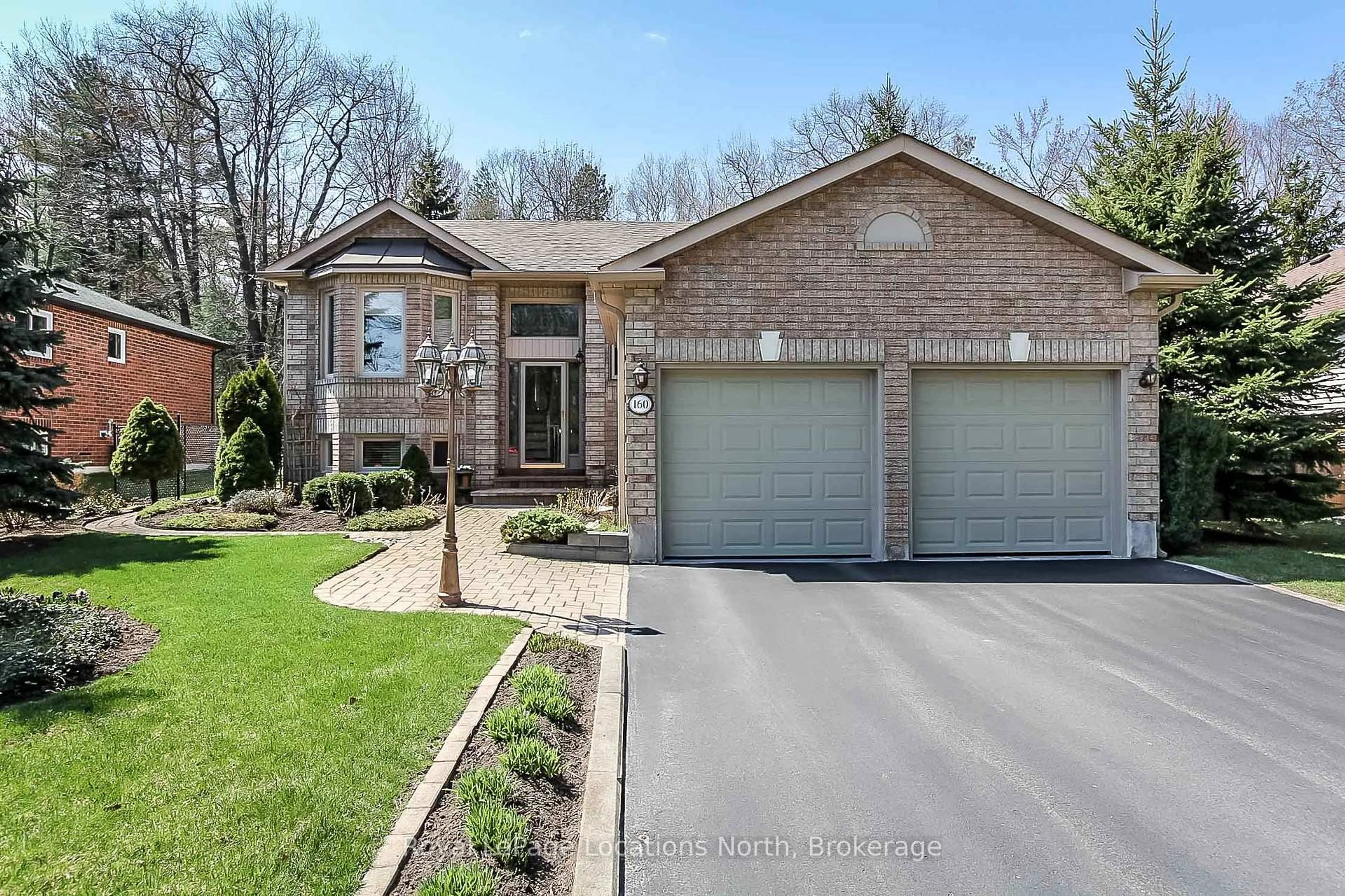 Home with brick exterior material, street for 160 Fernbrook Dr, Wasaga Beach Ontario L9Z 1G9