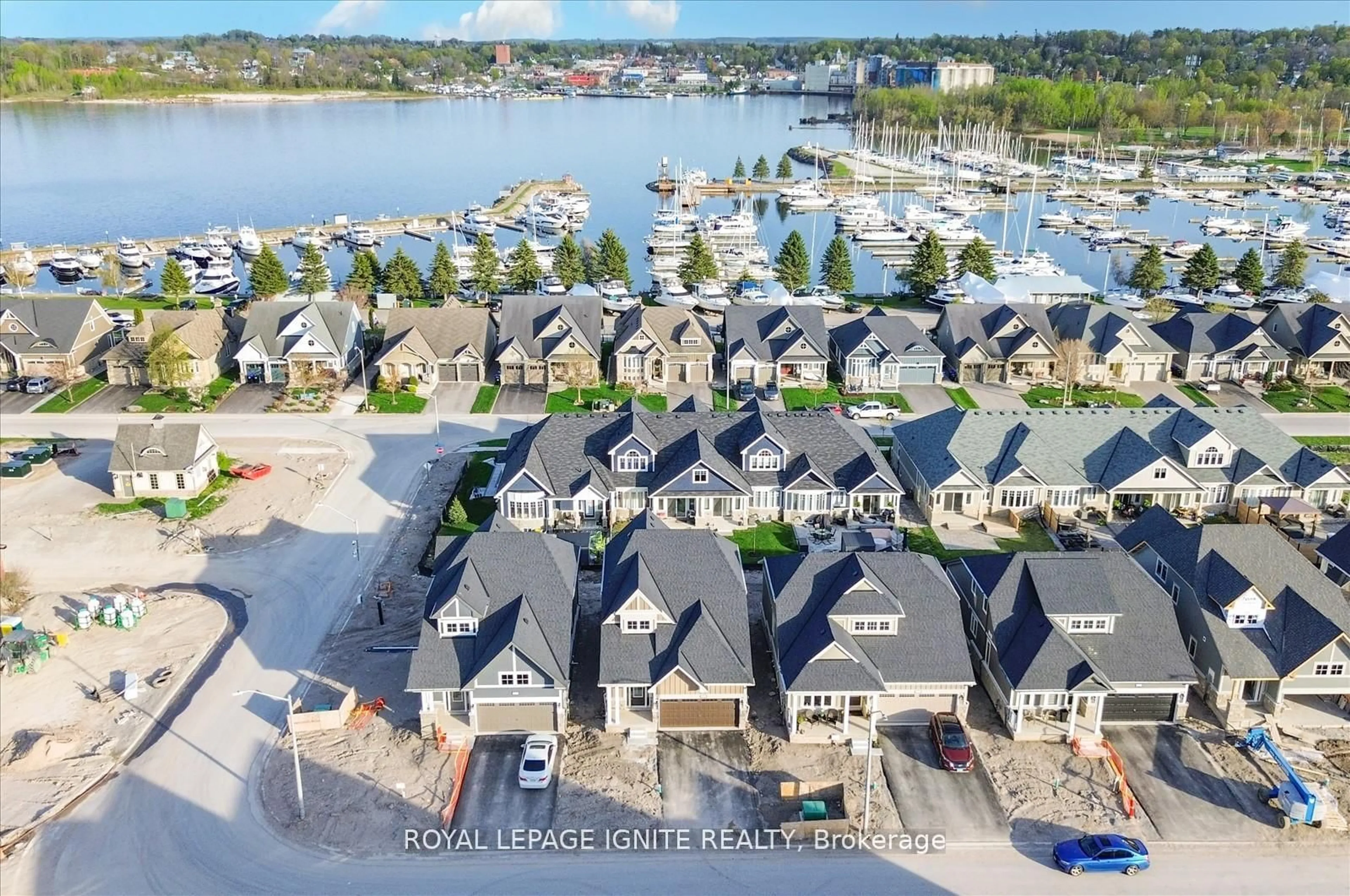 A pic from outside/outdoor area/front of a property/back of a property/a pic from drone, water/lake/river/ocean view for 519 Hudson Cres, Midland Ontario L4R 0J2