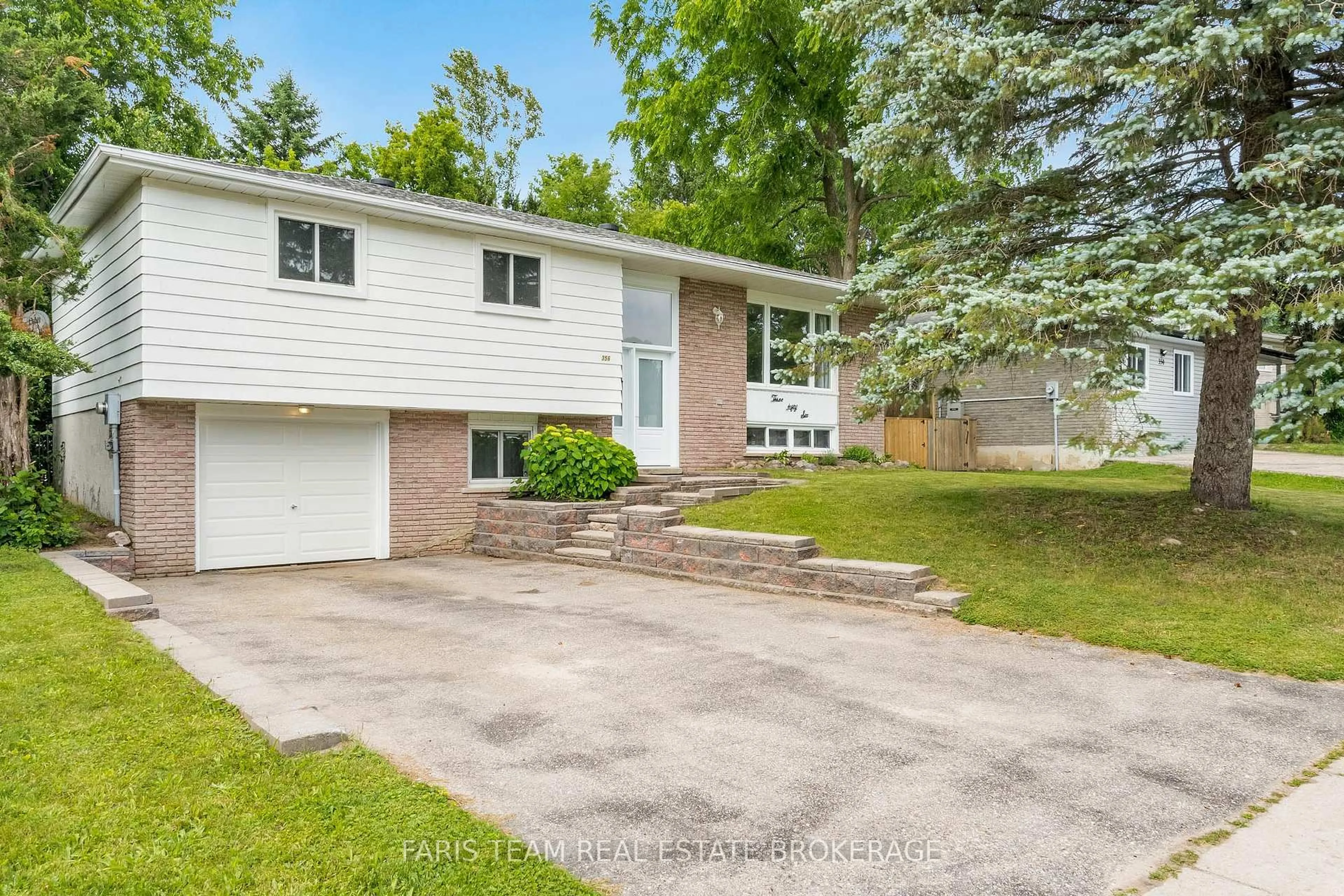 Home with vinyl exterior material, street for 356 Lescaut Rd, Midland Ontario L4R 2P2