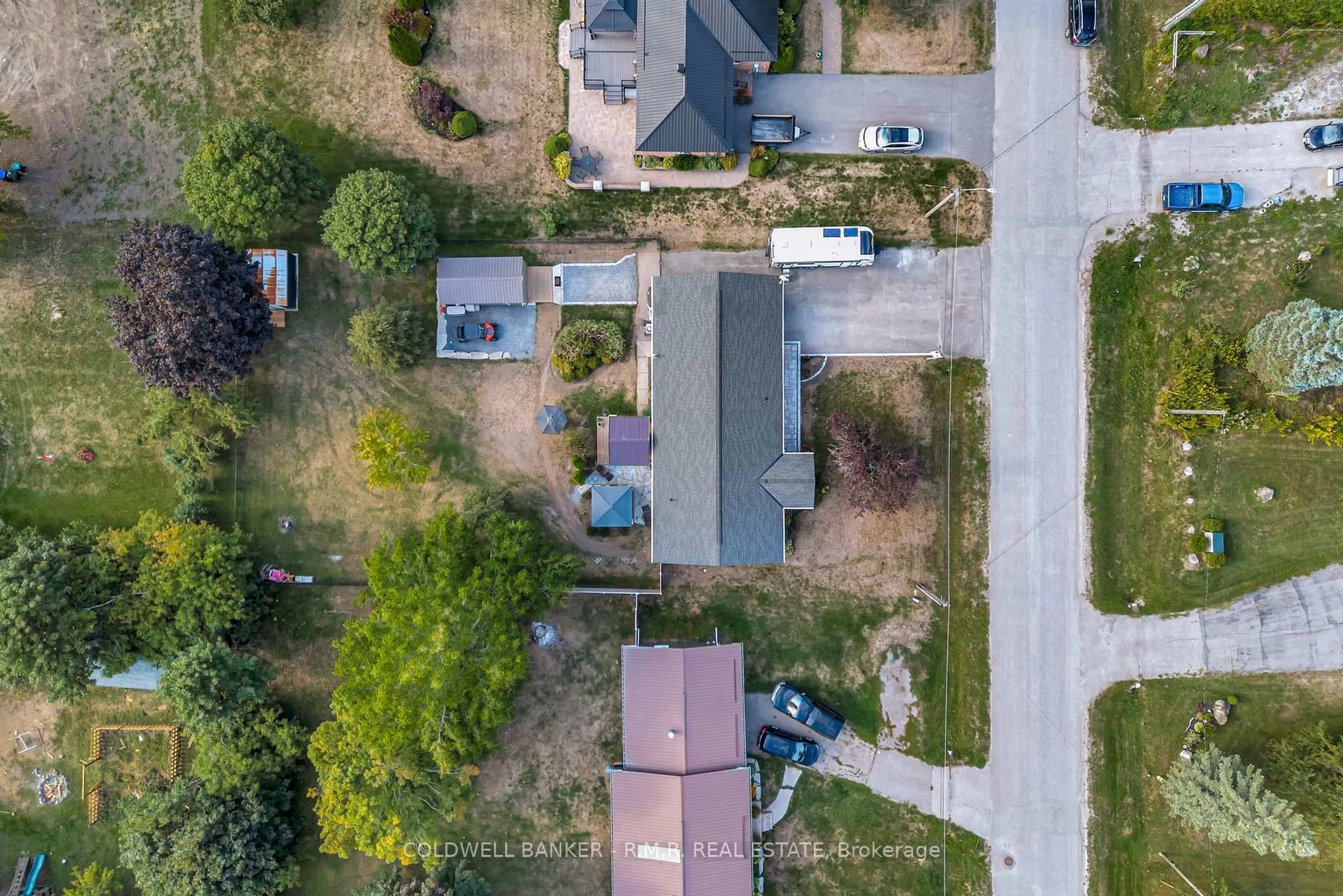 A pic from outside/outdoor area/front of a property/back of a property/a pic from drone, street for 2850 Perry Ave, Ramara Ontario L0K 1B0