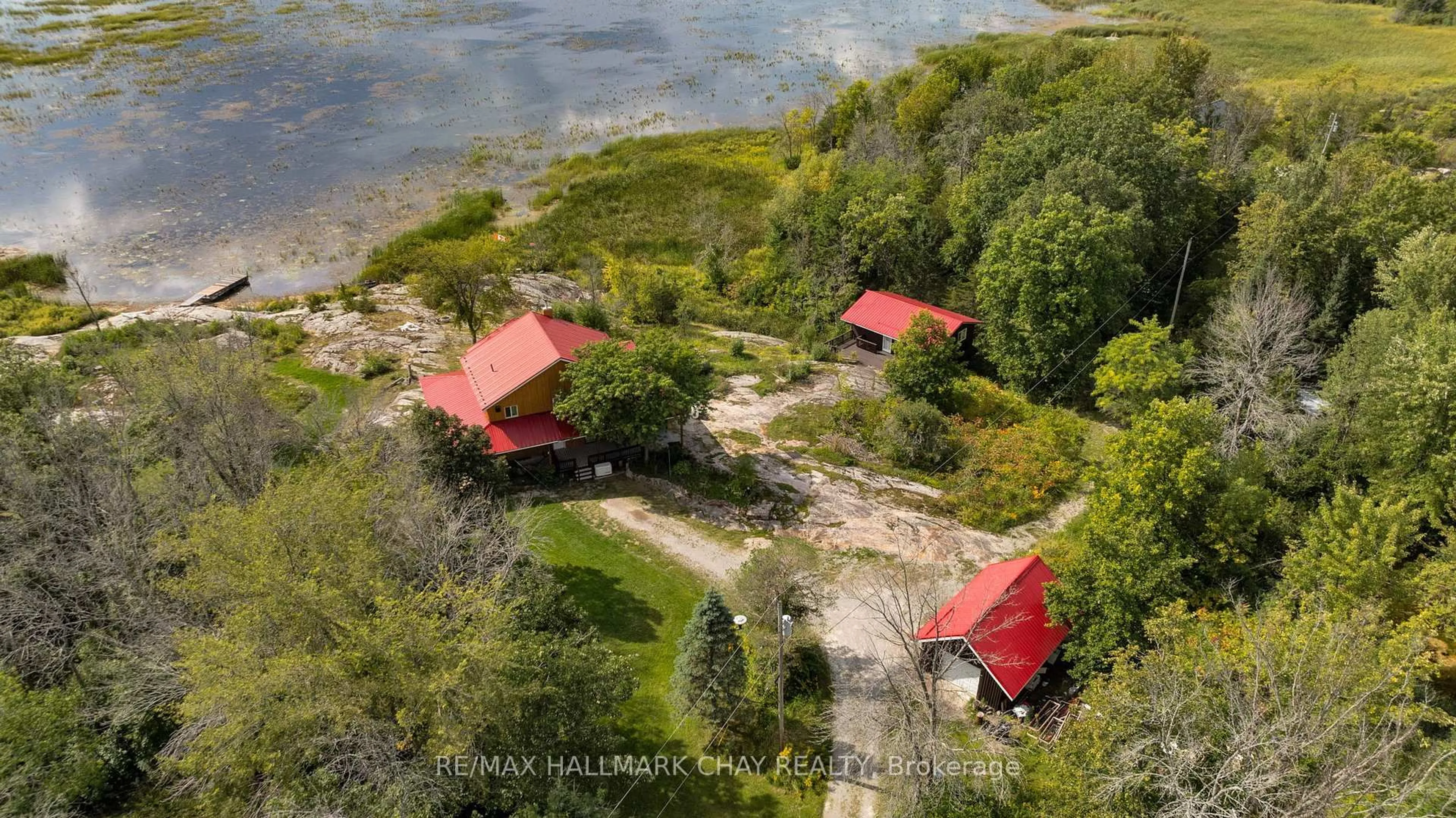 A pic from outside/outdoor area/front of a property/back of a property/a pic from drone, water/lake/river/ocean view for 1866 Tay Bay Rd, Severn Ontario L0K 1E0