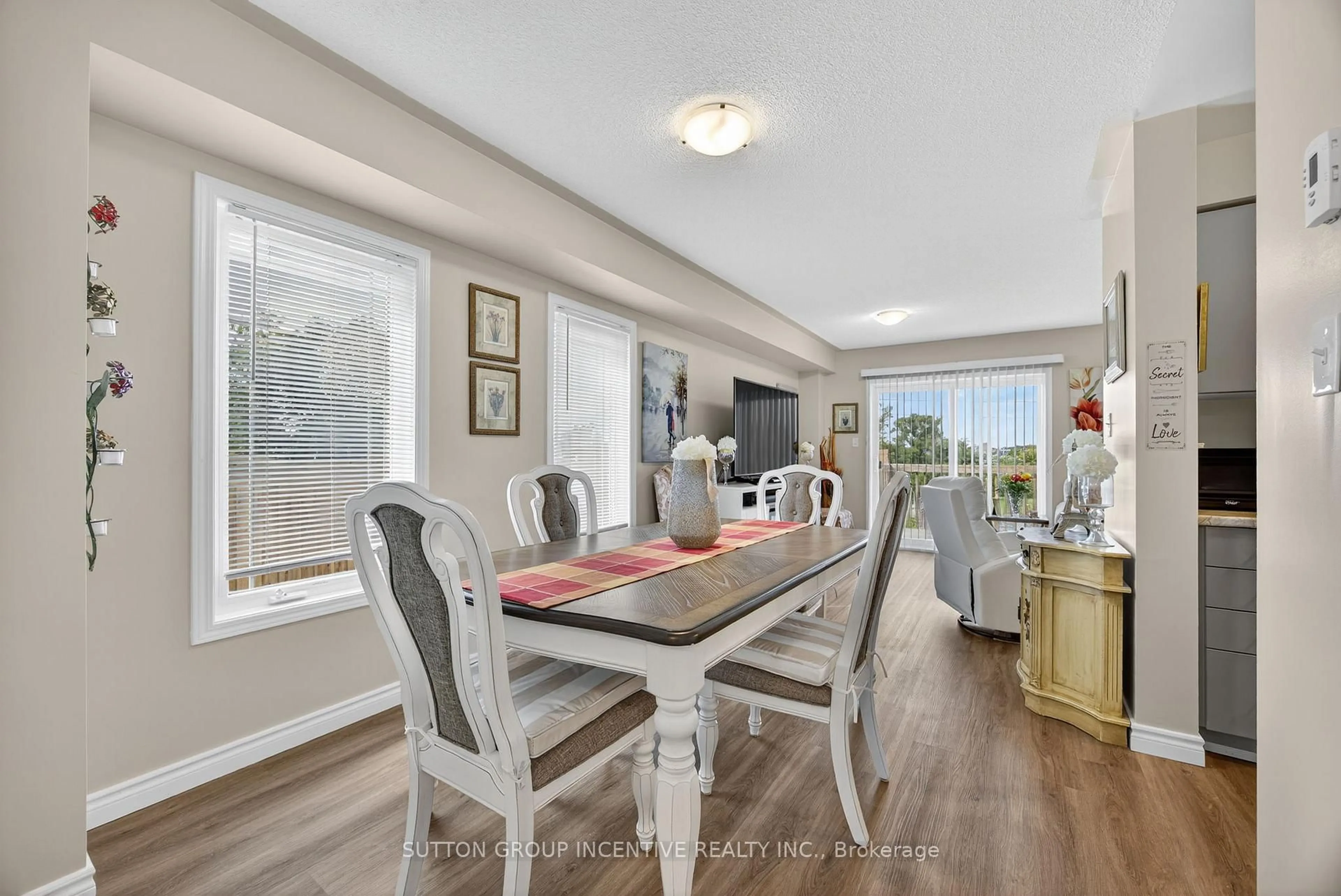Dining room, wood/laminate floor for 23 Frank's Way, Barrie Ontario L4N 3J1