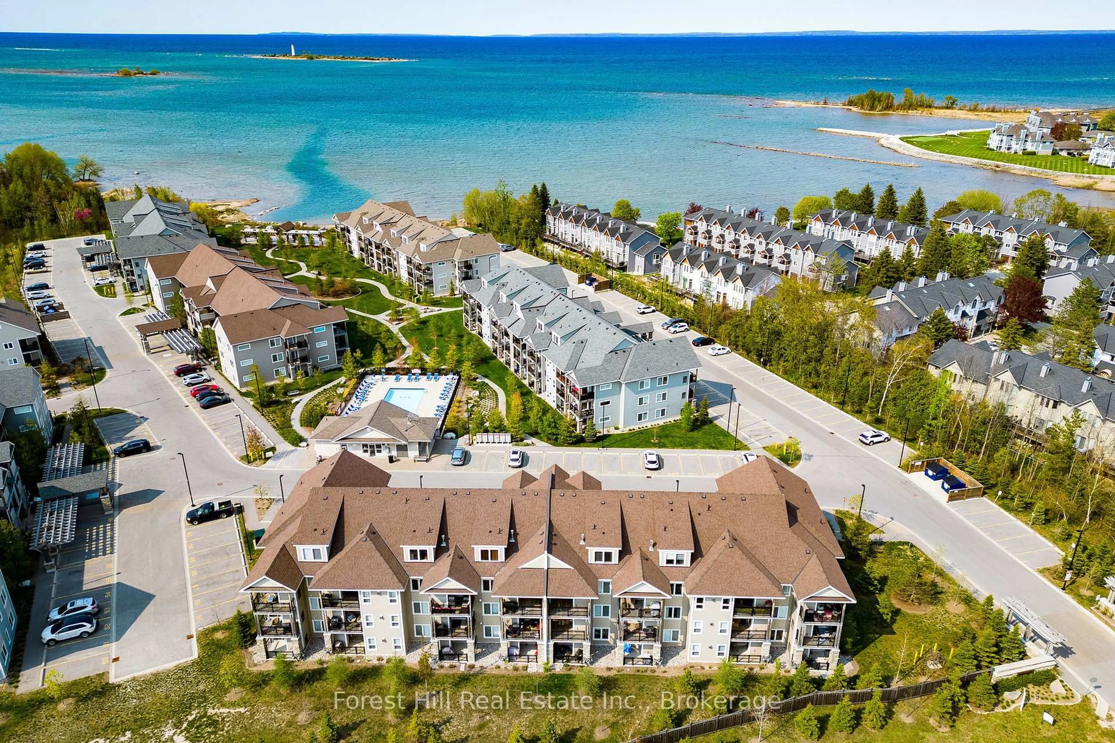 A pic from outside/outdoor area/front of a property/back of a property/a pic from drone, water/lake/river/ocean view for 2 ANCHORAGE Cres #108, Collingwood Ontario L9Y 0Y6