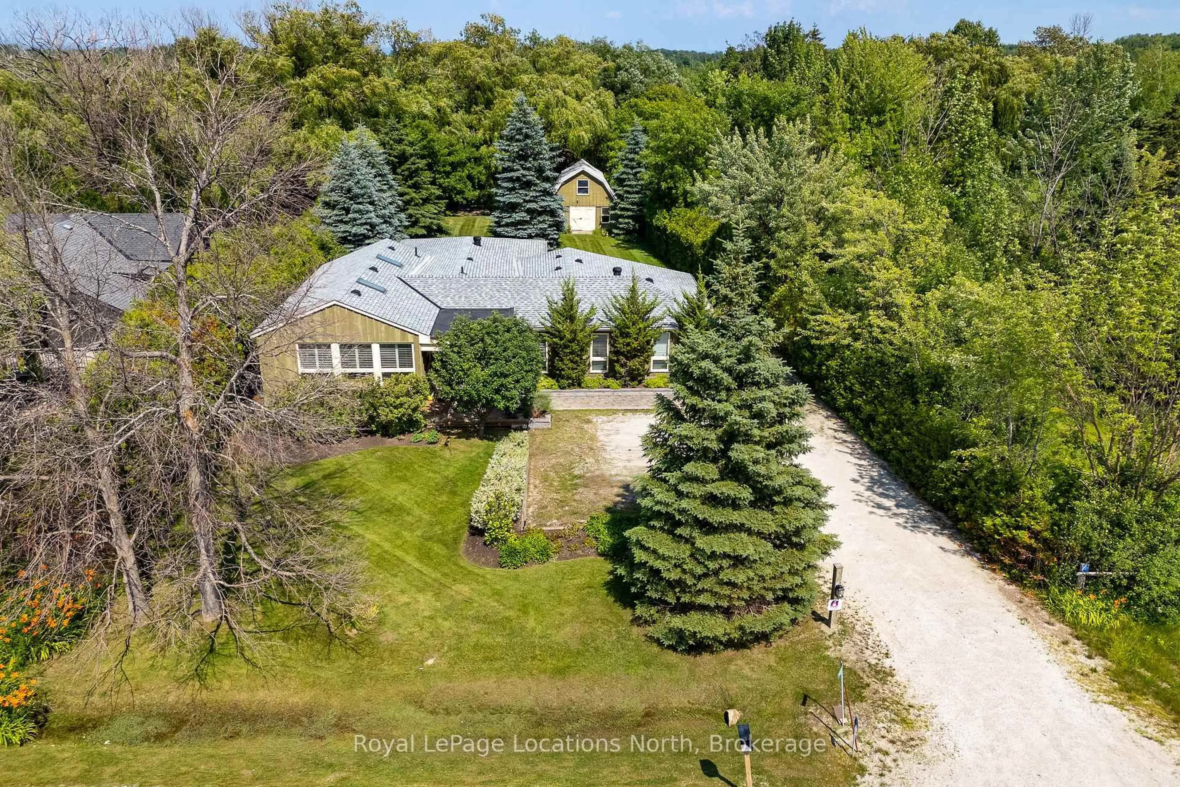 A pic from outside/outdoor area/front of a property/back of a property/a pic from drone, unknown for 795853 Grey 19 Rd, Collingwood Ontario L9Y 3Y9