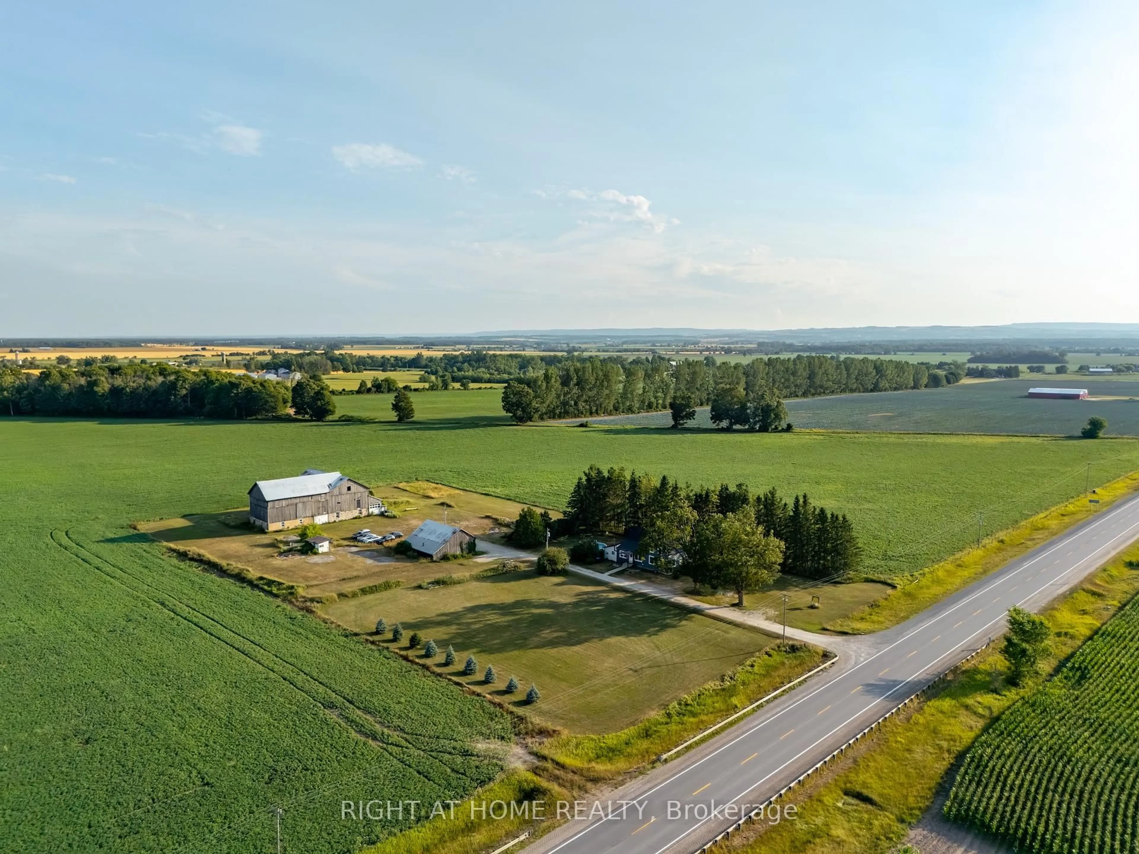 A pic from outside/outdoor area/front of a property/back of a property/a pic from drone, water/lake/river/ocean view for 5803 26 Highway, Clearview Ontario L0M 1S0