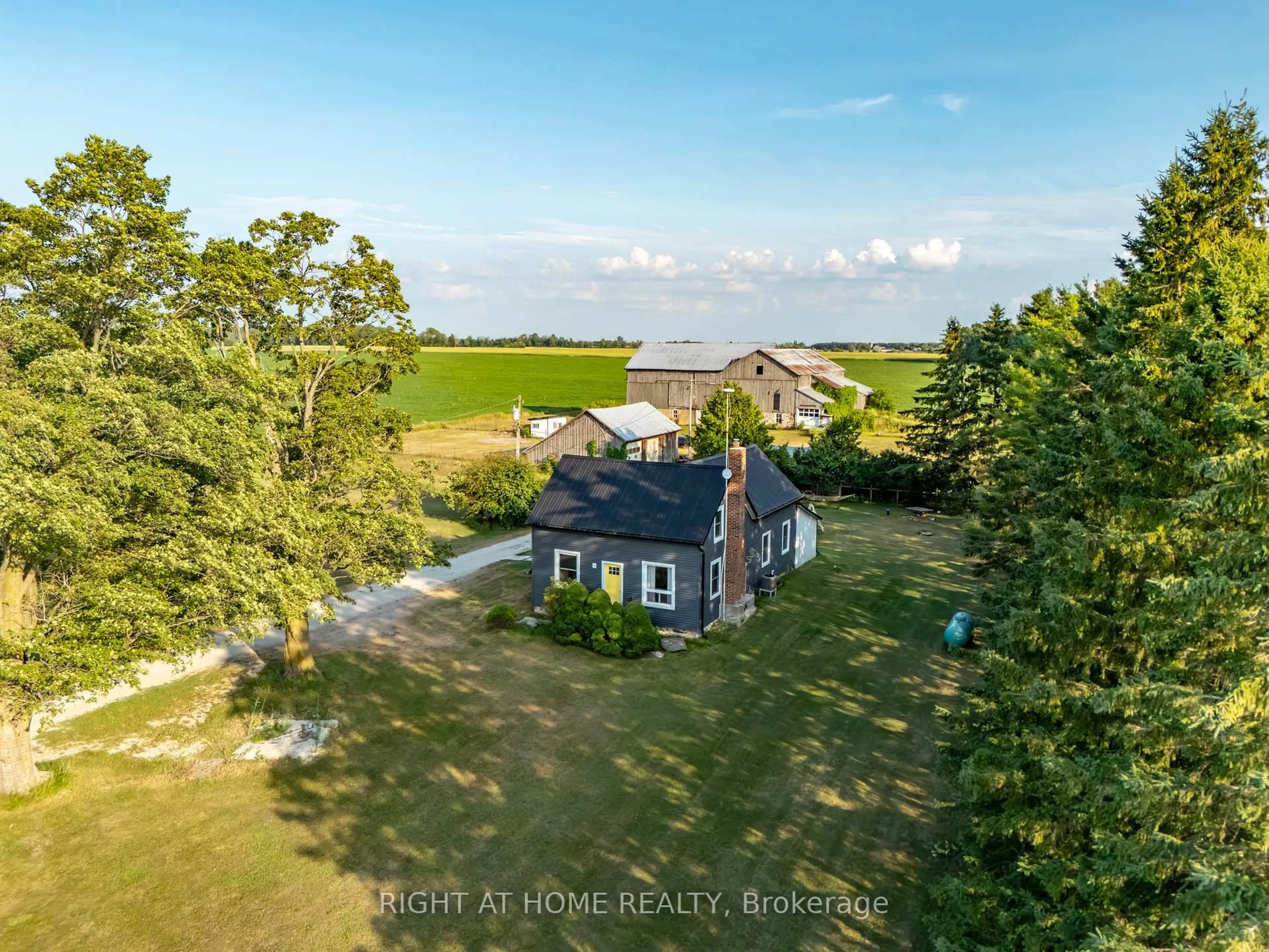 A pic from outside/outdoor area/front of a property/back of a property/a pic from drone, water/lake/river/ocean view for 5803 26 Highway, Clearview Ontario L0M 1S0