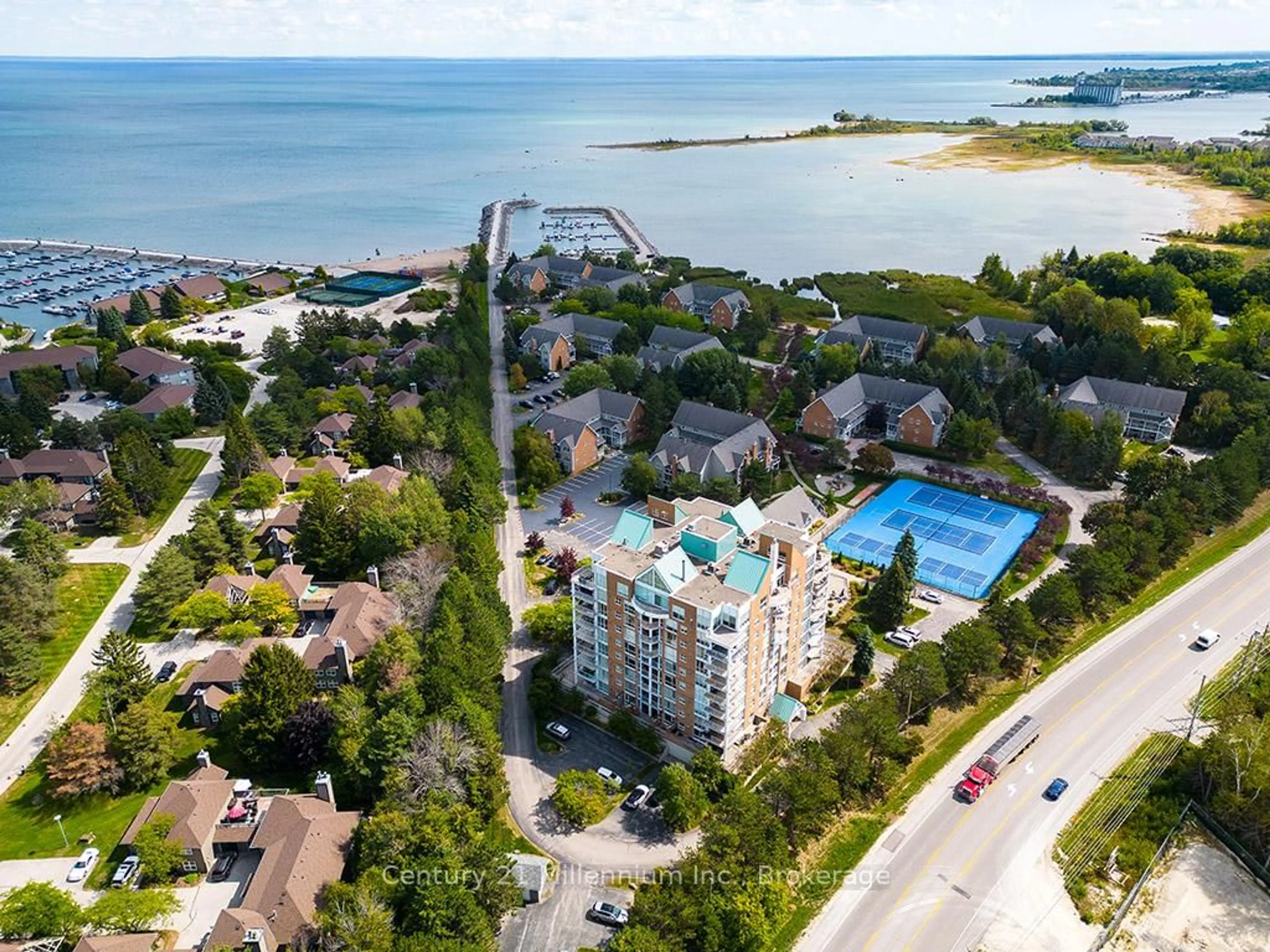 A pic from outside/outdoor area/front of a property/back of a property/a pic from drone, water/lake/river/ocean view for 24 Ramblings Way #703, Collingwood Ontario L9Y 5C6