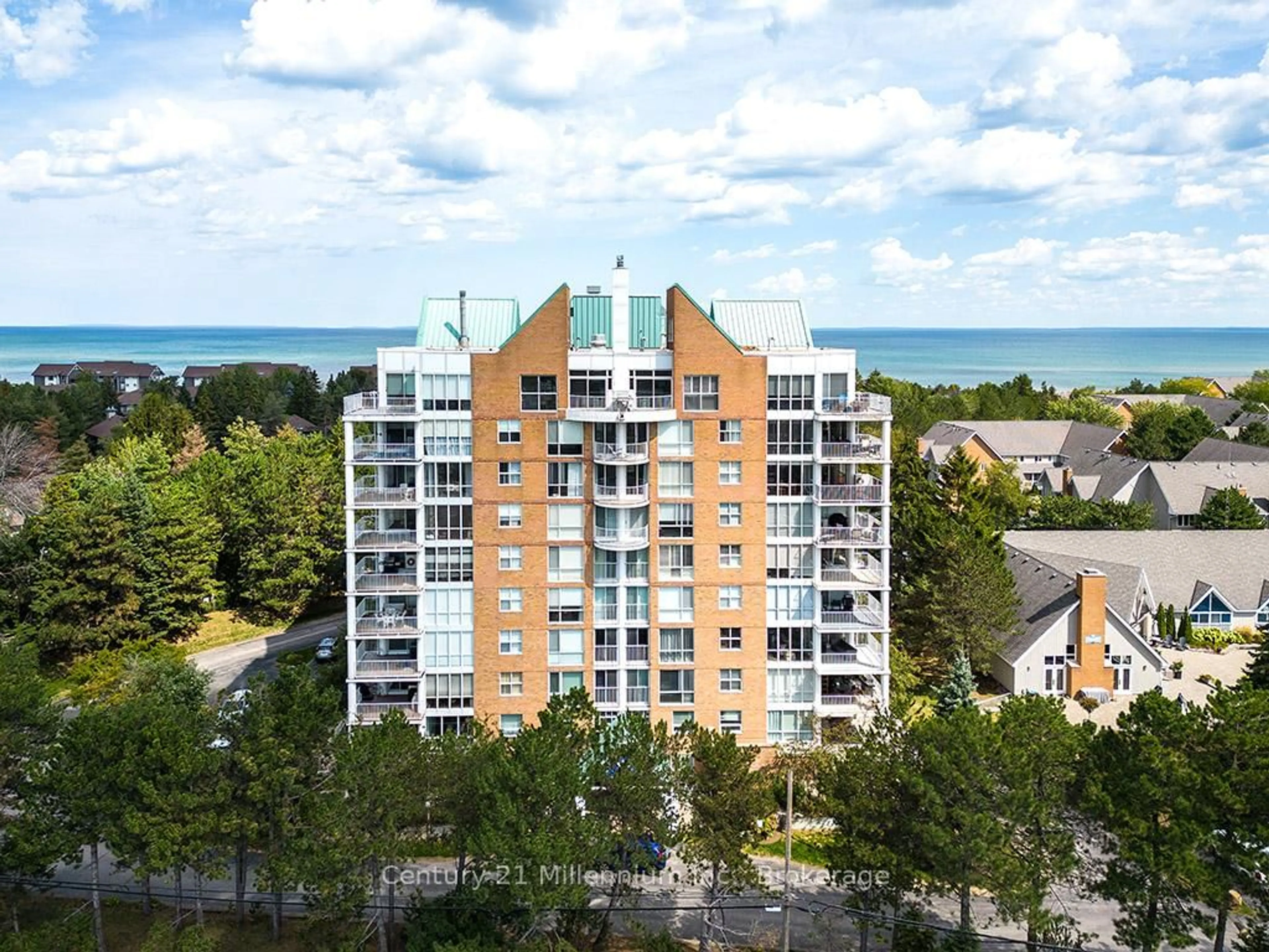 A pic from outside/outdoor area/front of a property/back of a property/a pic from drone, unknown for 24 Ramblings Way #703, Collingwood Ontario L9Y 5C6