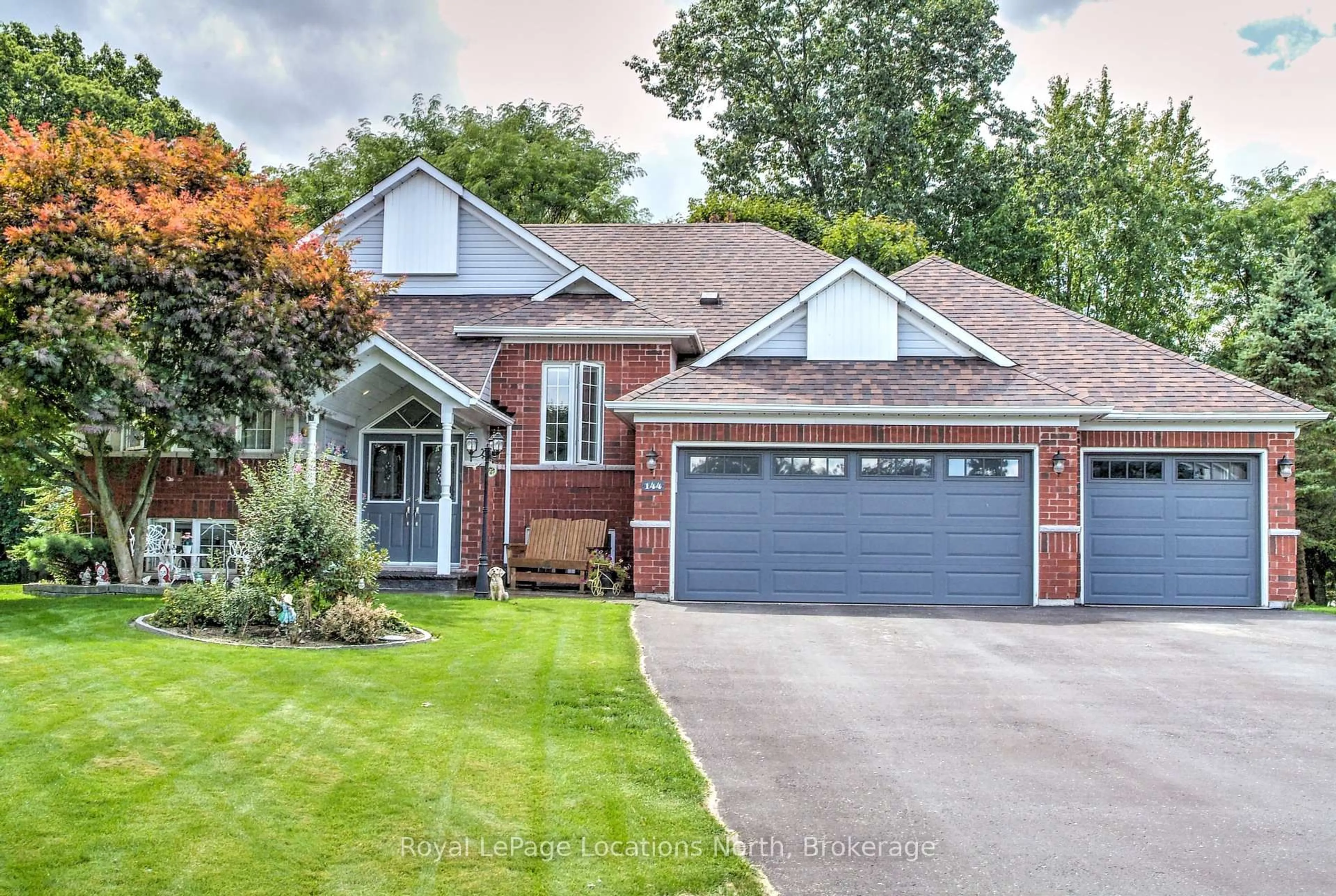 Home with brick exterior material, street for 144 Royal Beech Dr, Wasaga Beach Ontario L9Z 2N3