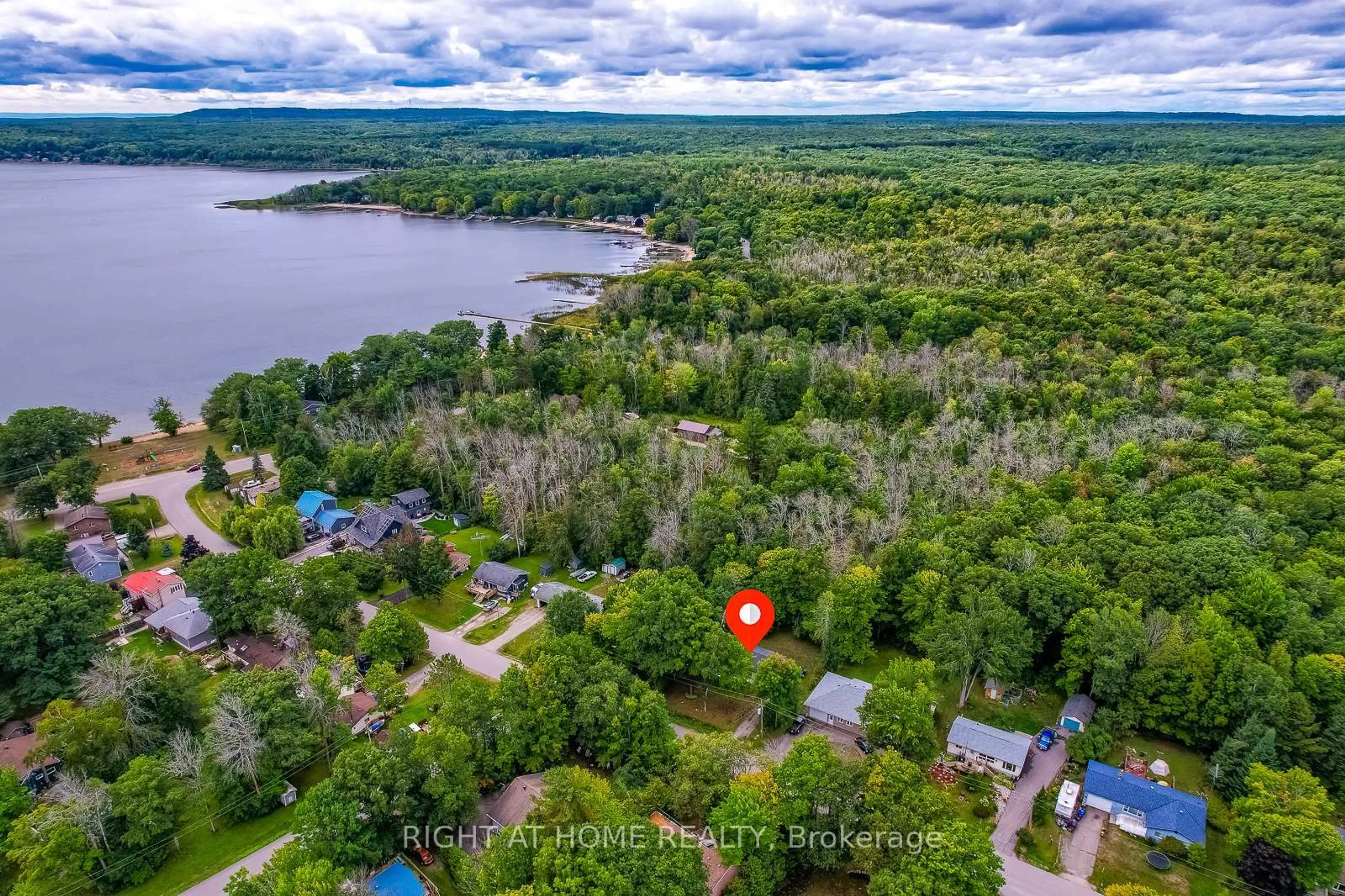 A pic from outside/outdoor area/front of a property/back of a property/a pic from drone, water/lake/river/ocean view for 29 NIDA Dr, Tiny Ontario L9M 0B3