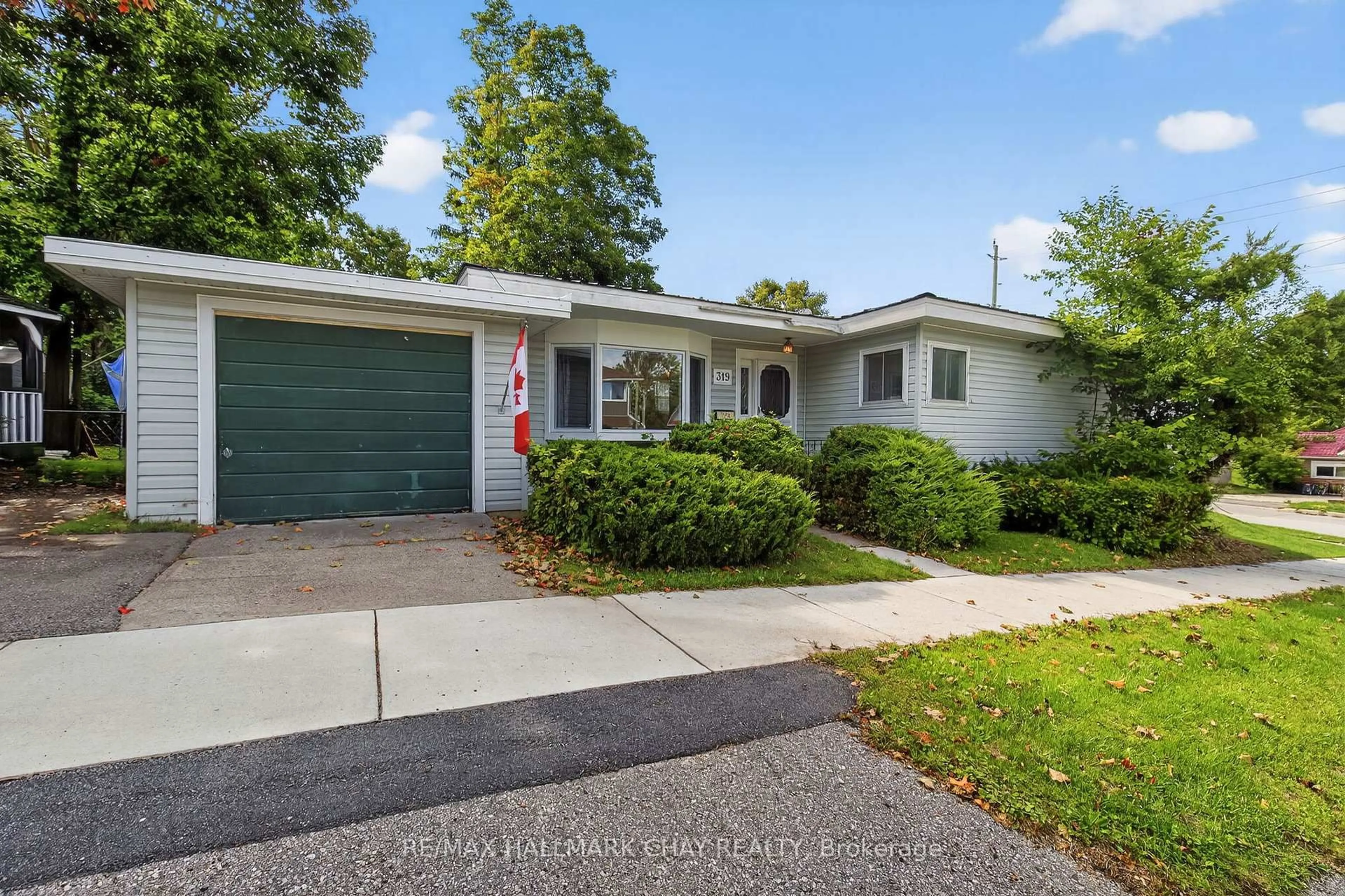 Home with vinyl exterior material, street for 319 Mississaga St, Orillia Ontario L3V 3C2