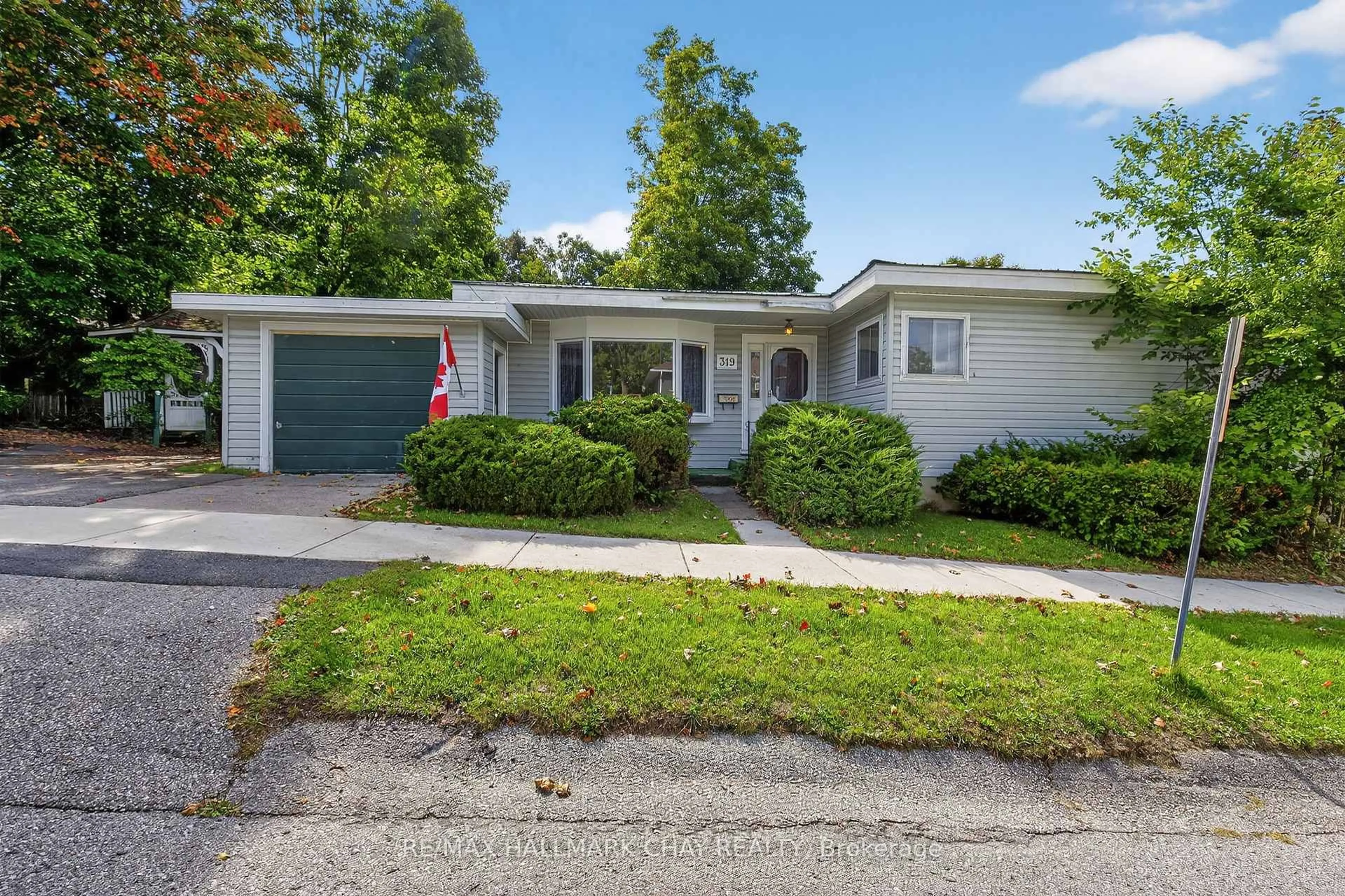 Home with vinyl exterior material, street for 319 Mississaga St, Orillia Ontario L3V 3C2