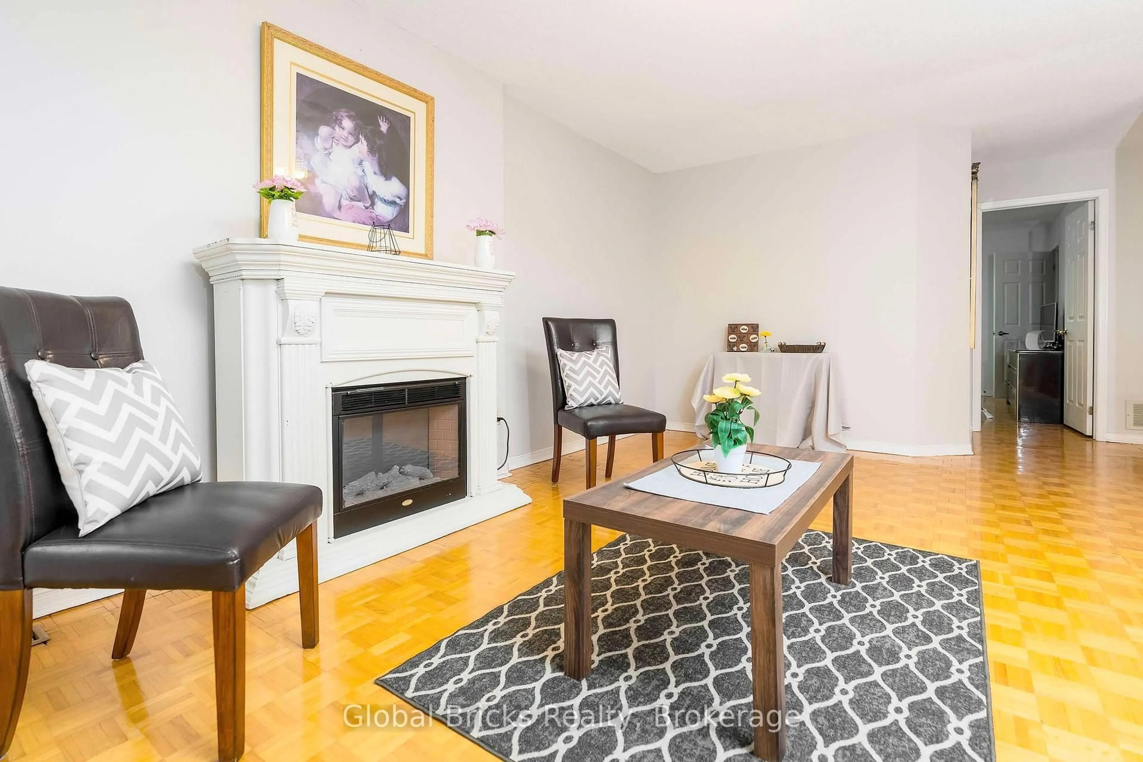Living room with furniture, wood/laminate floor for 573 Mosley St, Wasaga Beach Ontario L9Z 2J4