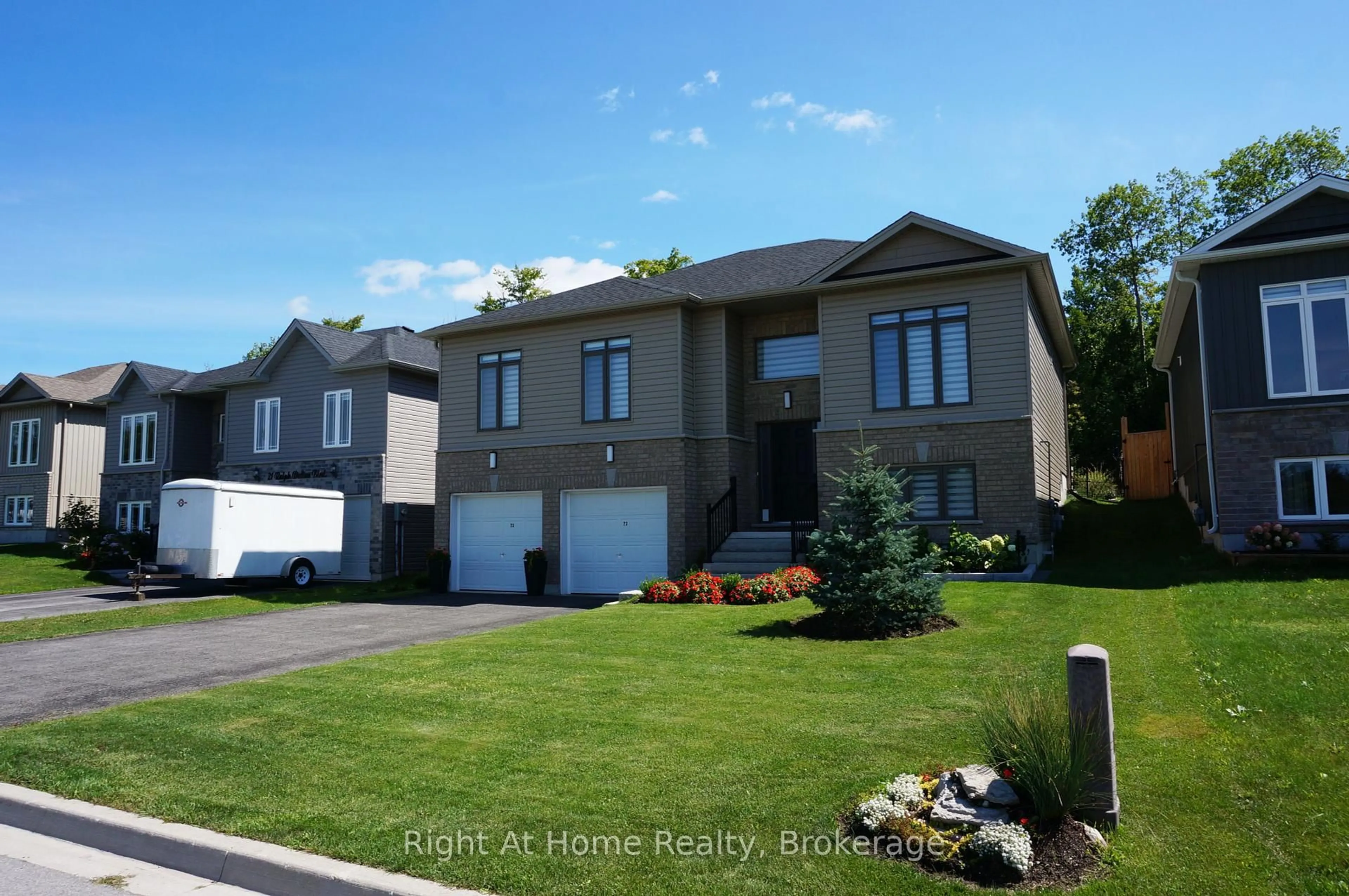 Home with vinyl exterior material, street for 23 Ralph Dalton Blvd, Tay Ontario L0K 2A0