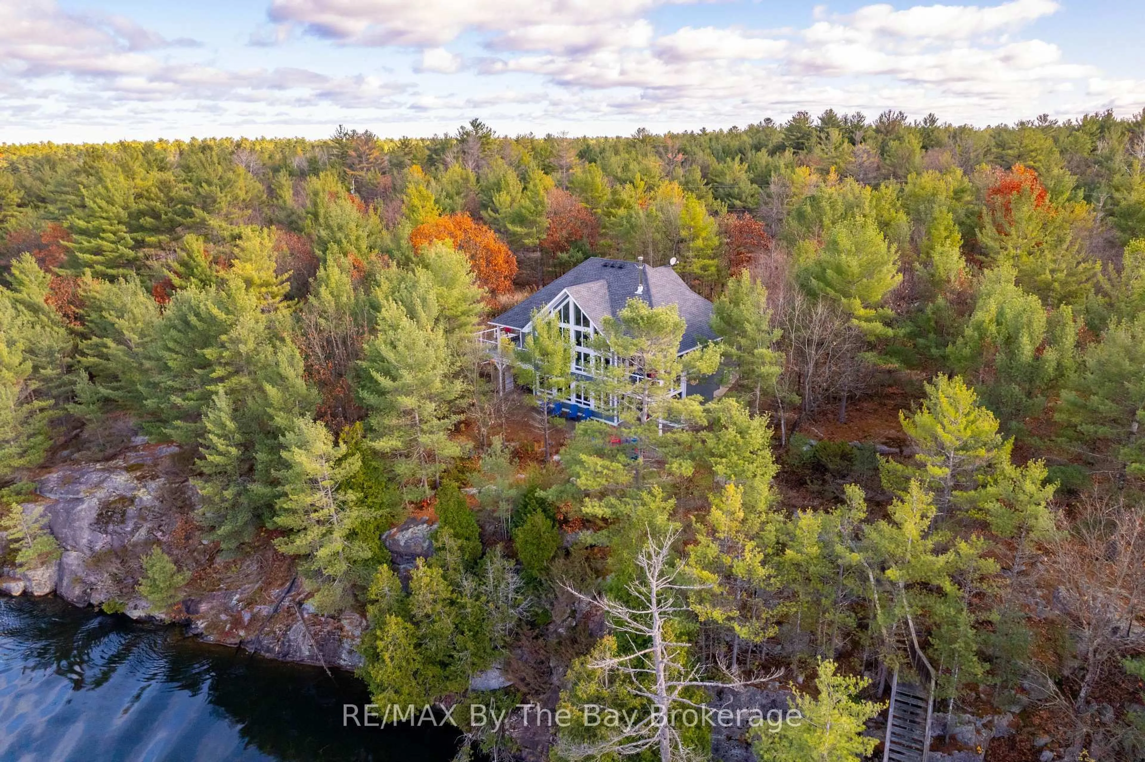 A pic from outside/outdoor area/front of a property/back of a property/a pic from drone, water/lake/river/ocean view for 4330 Marr Lane, Severn Ontario L0K 1E0