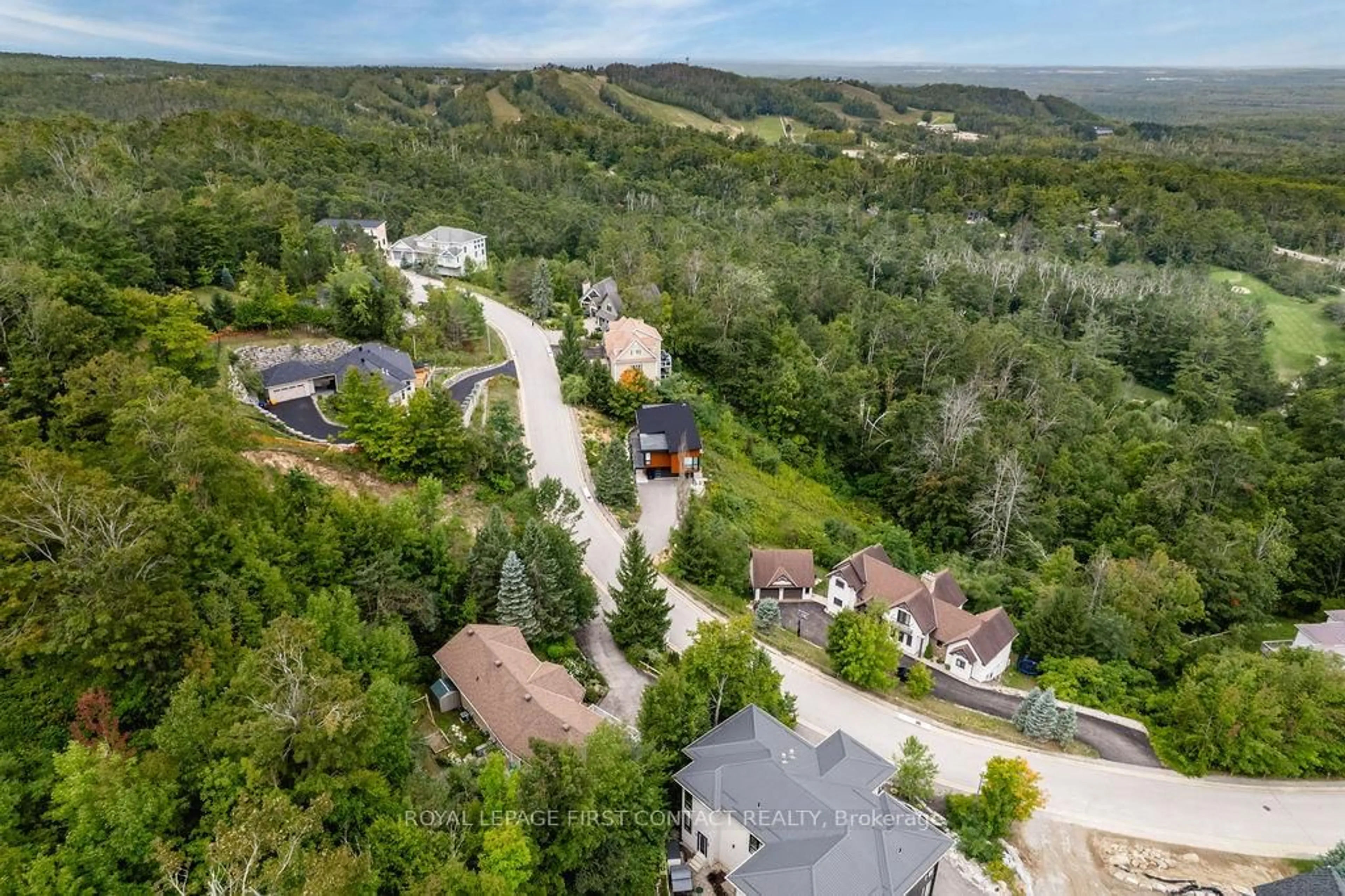 A pic from outside/outdoor area/front of a property/back of a property/a pic from drone, mountain view for 14 Valleycrest Dr, Oro-Medonte Ontario L0L 2L0