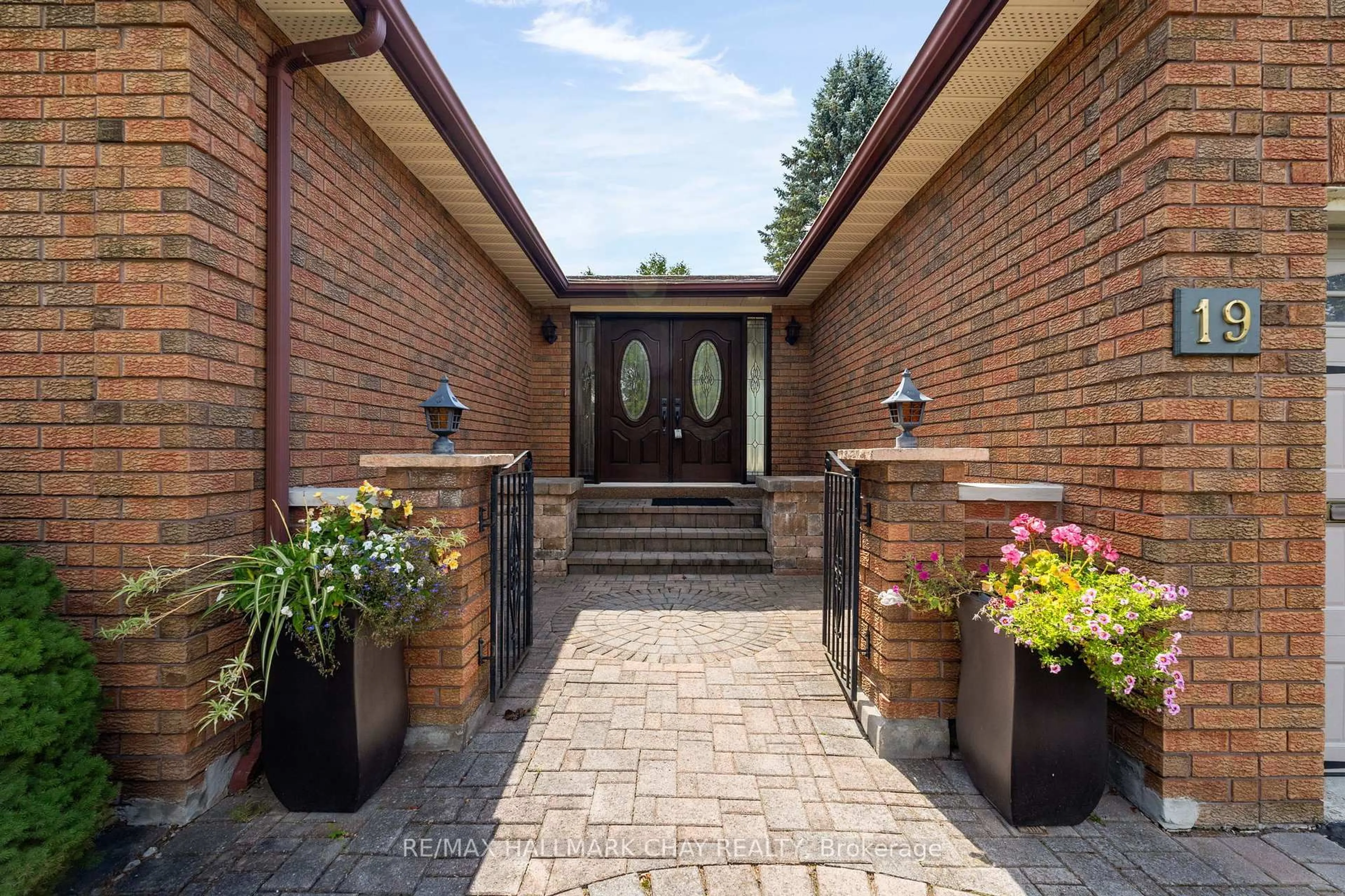 Home with brick exterior material, street for 19 Algonquin Tr, Barrie Ontario L4M 5M2