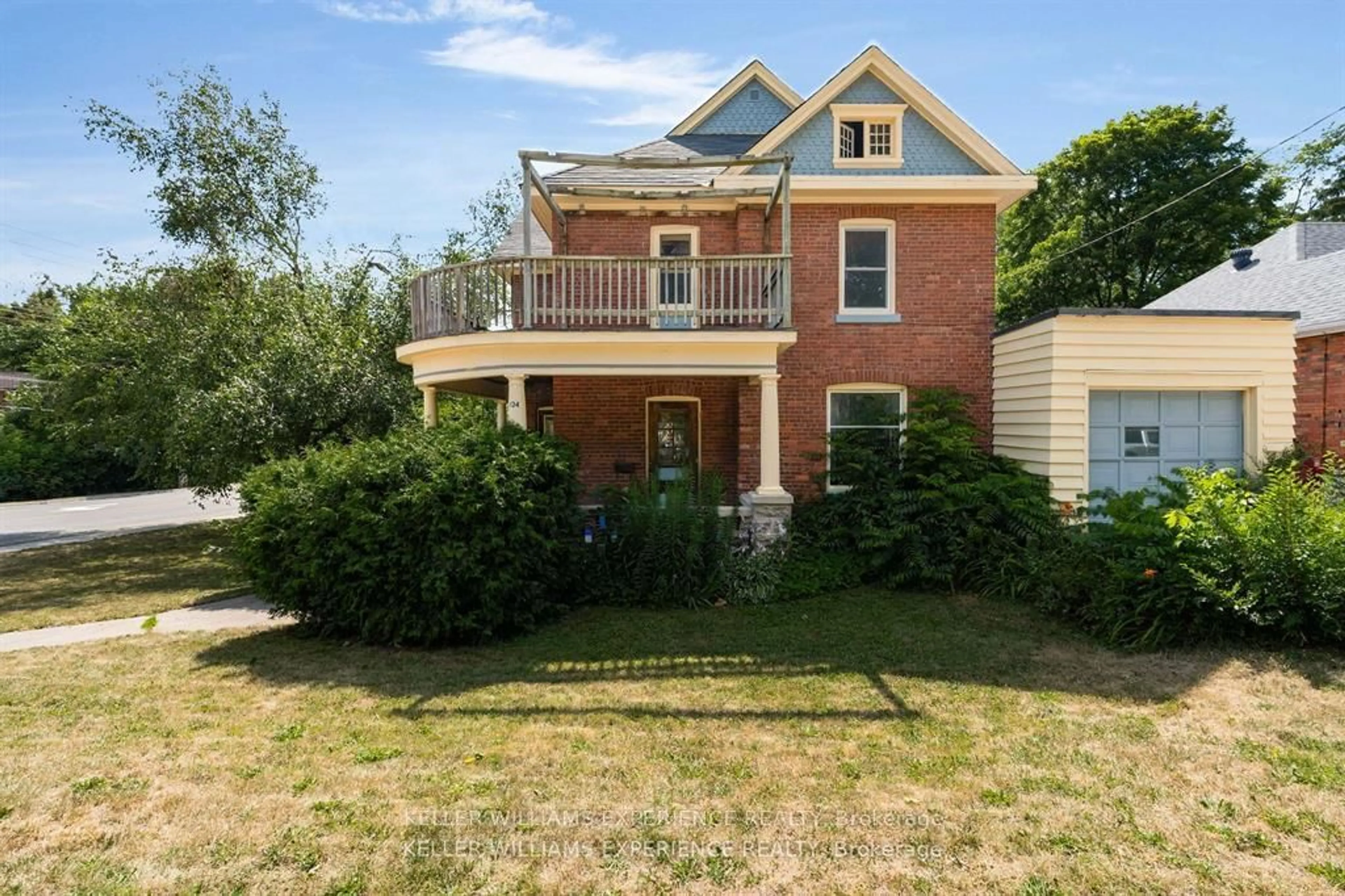 Home with brick exterior material, street for 134 Owen St, Barrie Ontario L4M 3H9