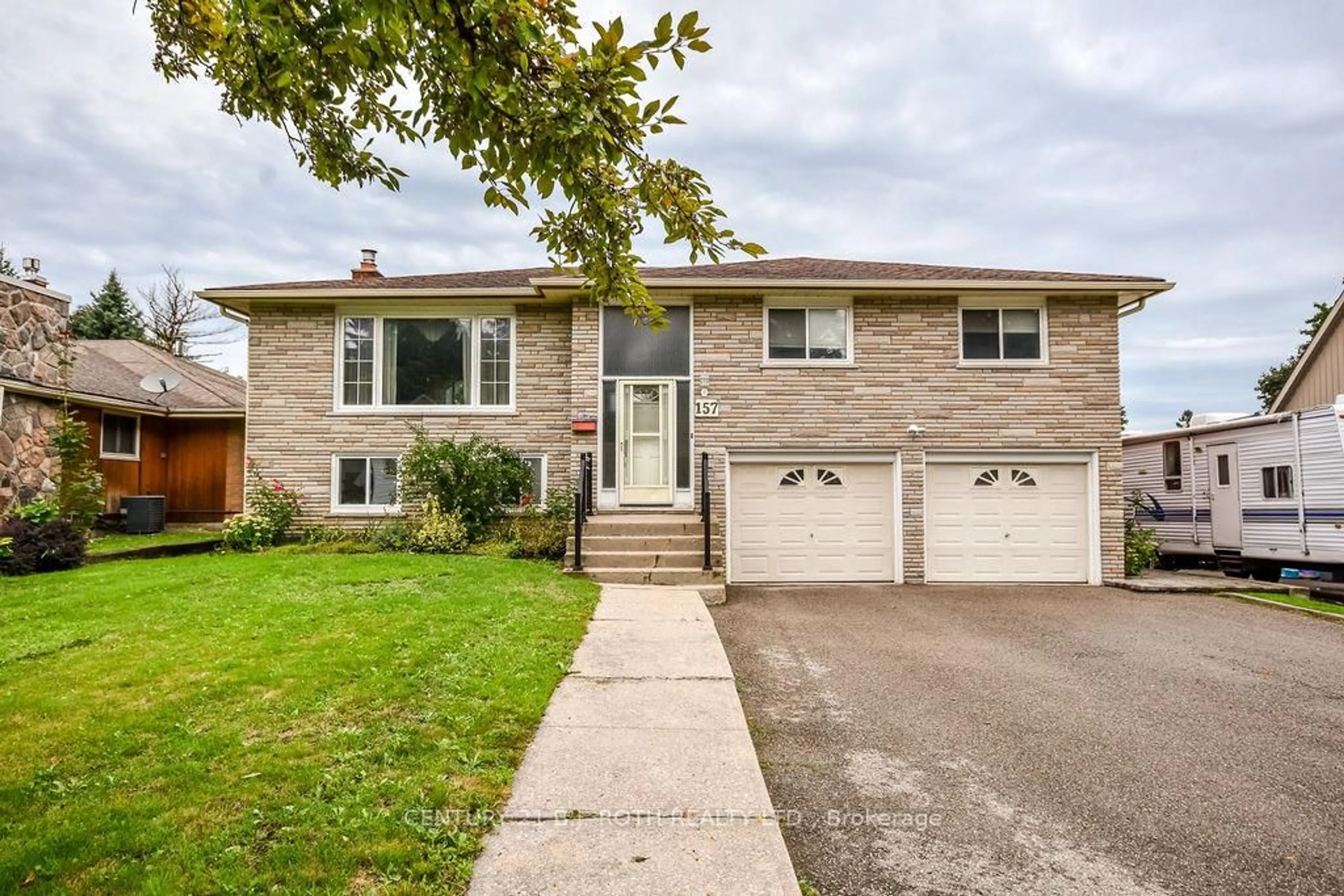 Home with brick exterior material, street for 157 Peel St, Barrie Ontario L4M 3L7