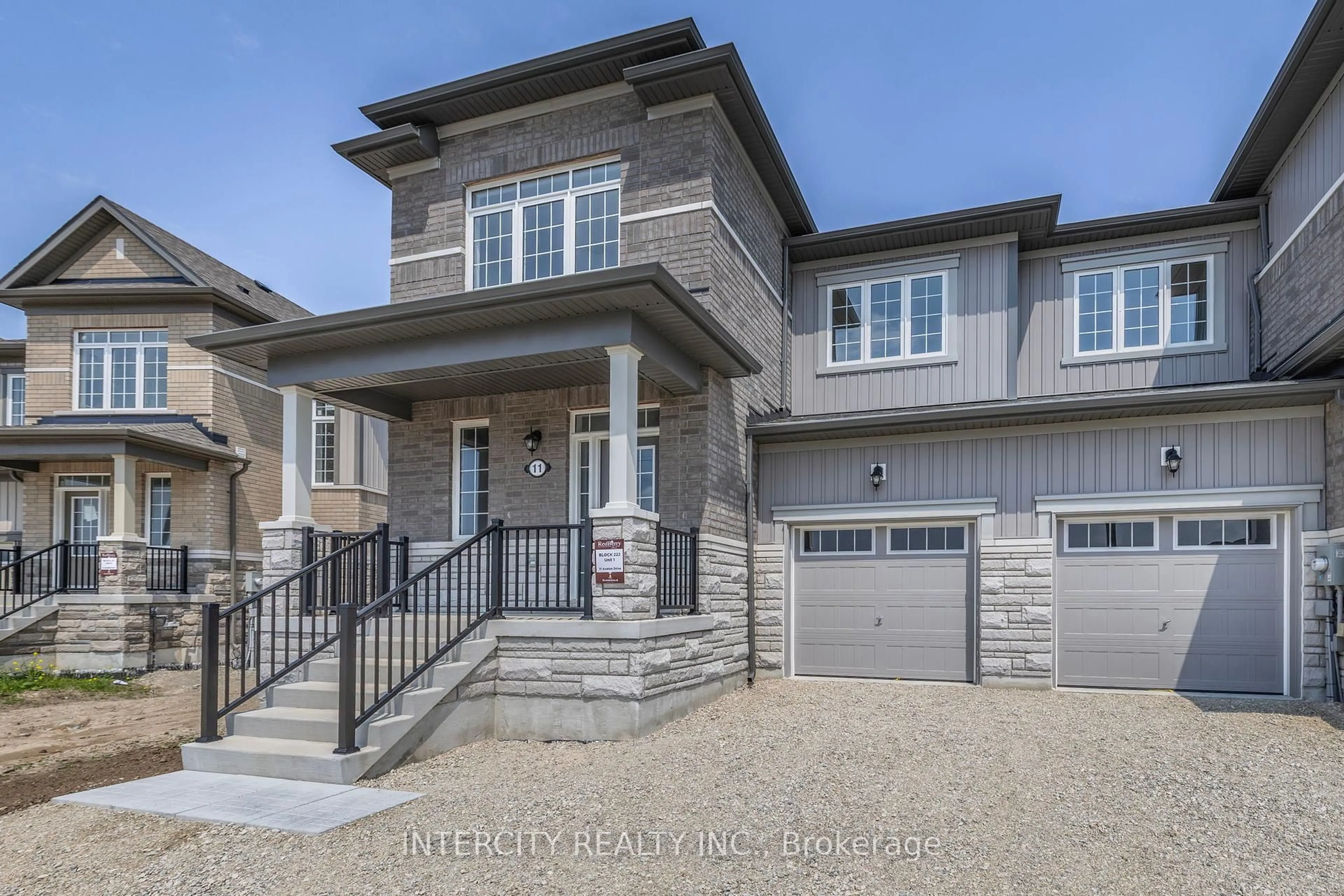 Home with brick exterior material, street for 11 Avalon Dr, Wasaga Beach Ontario L9R 0M2