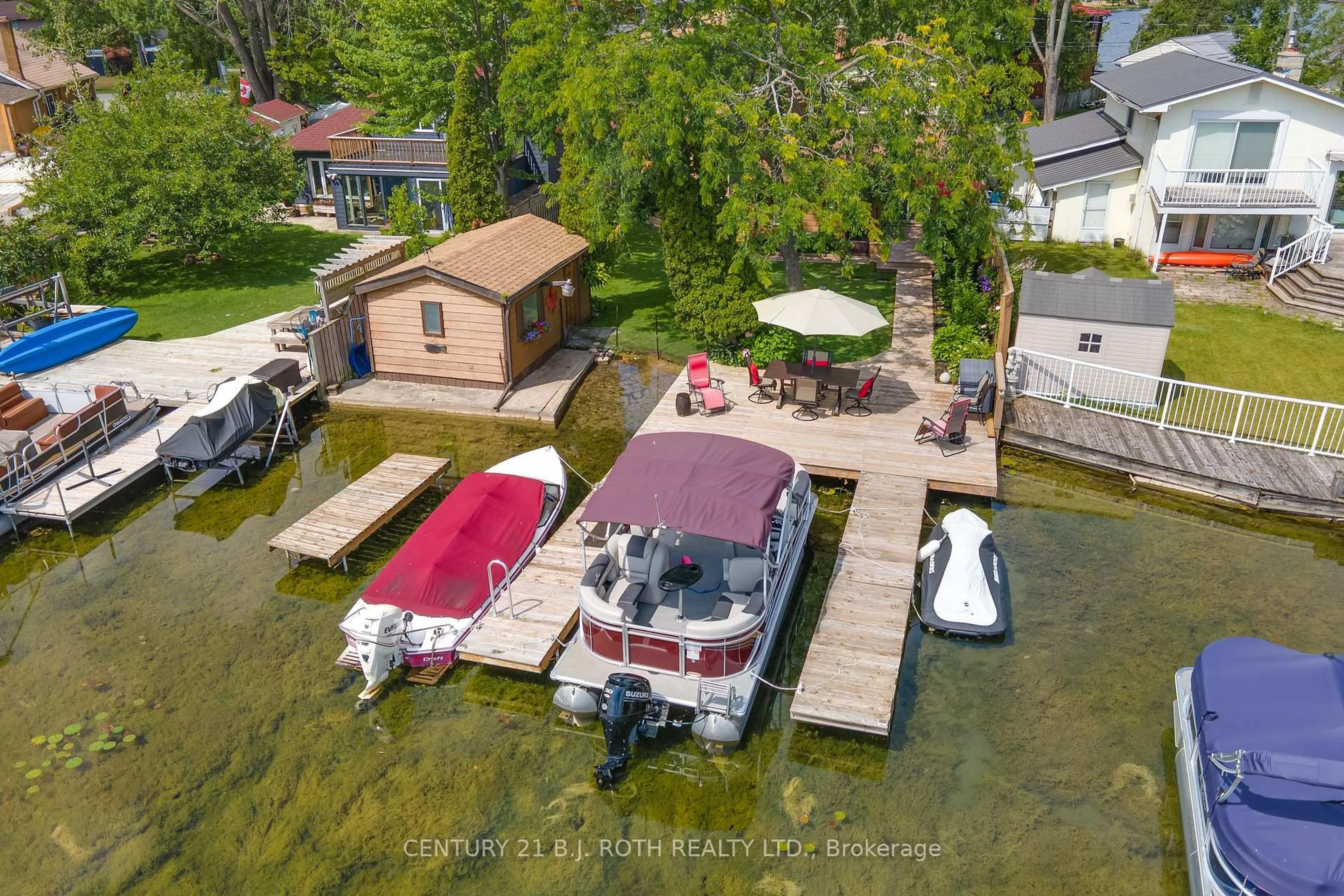 A pic from outside/outdoor area/front of a property/back of a property/a pic from drone, water/lake/river/ocean view for 175 Cedar Island Rd, Orillia Ontario L3V 1T2
