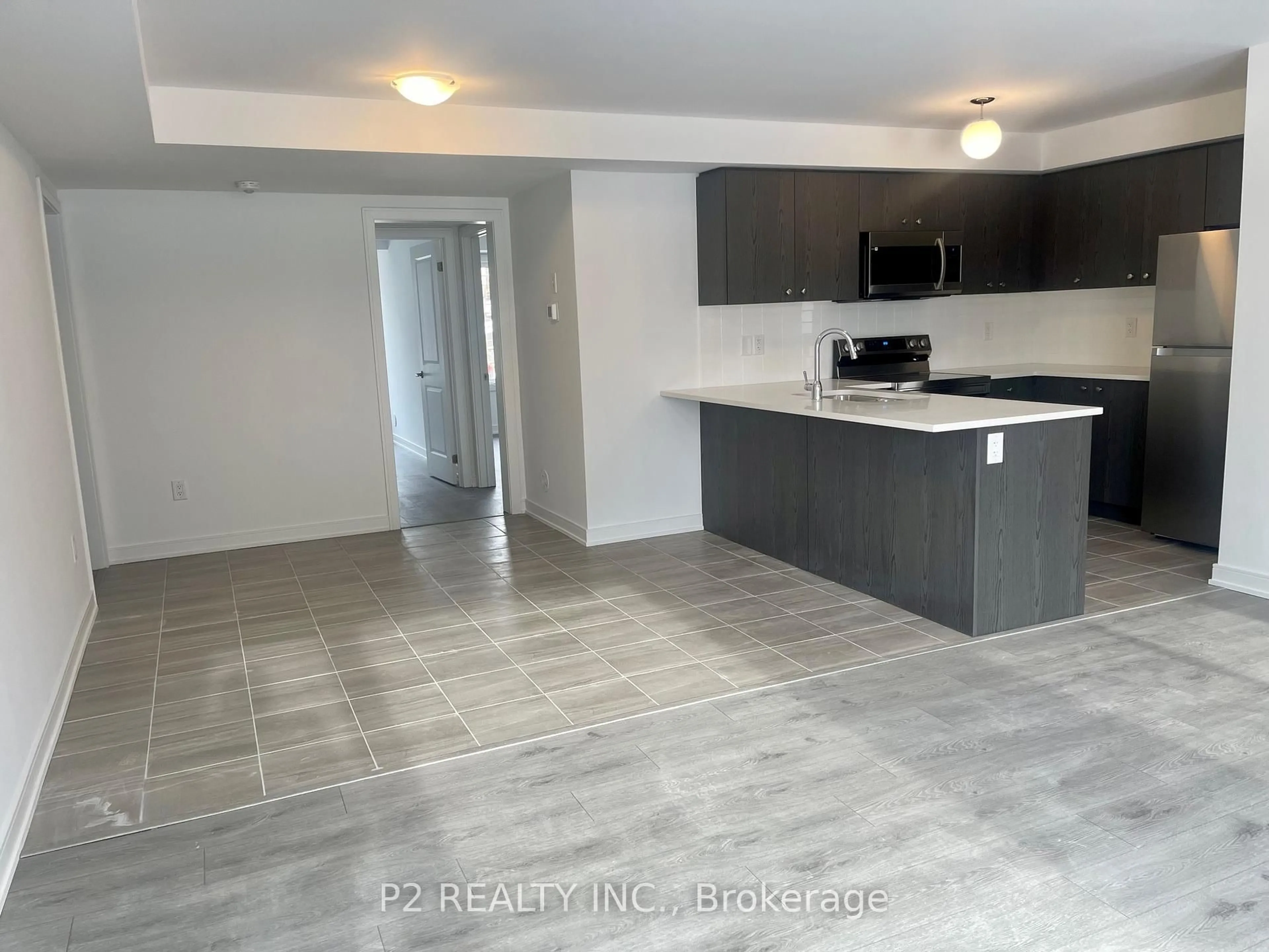 Open concept kitchen, ceramic/tile floor for 111 Appletree Lane #12, Barrie Ontario L9J 0N9